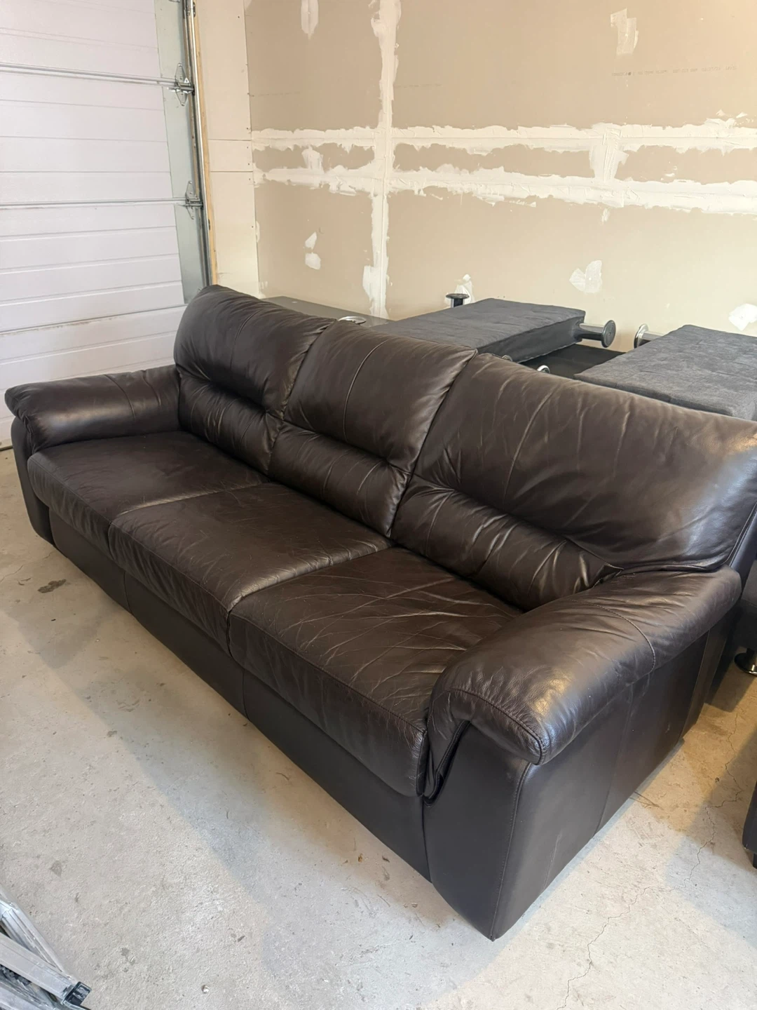 Black leather couch and chair