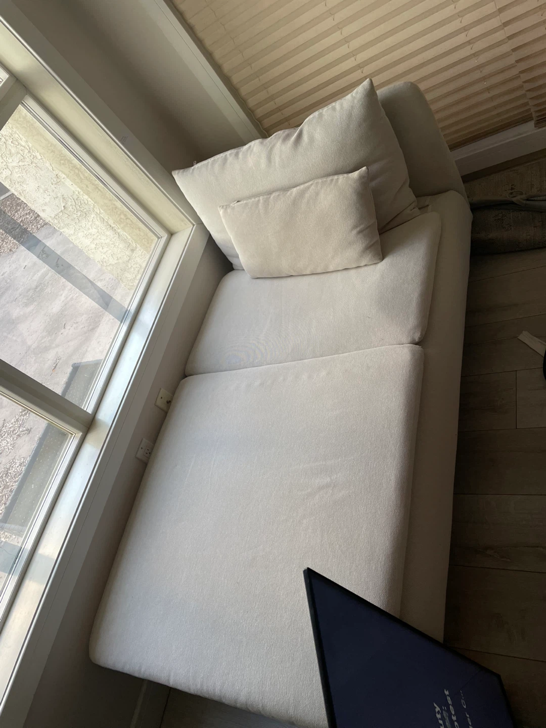 Cream Upholstered Chaise Lounge with Pillows