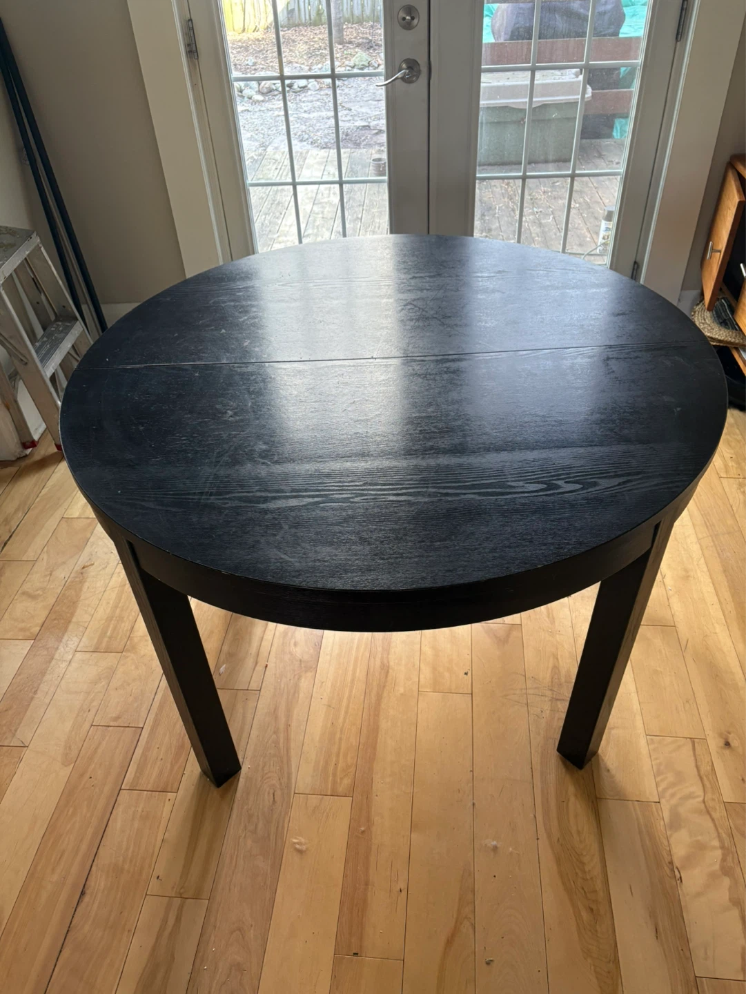 Round Black Extendable Dining Table