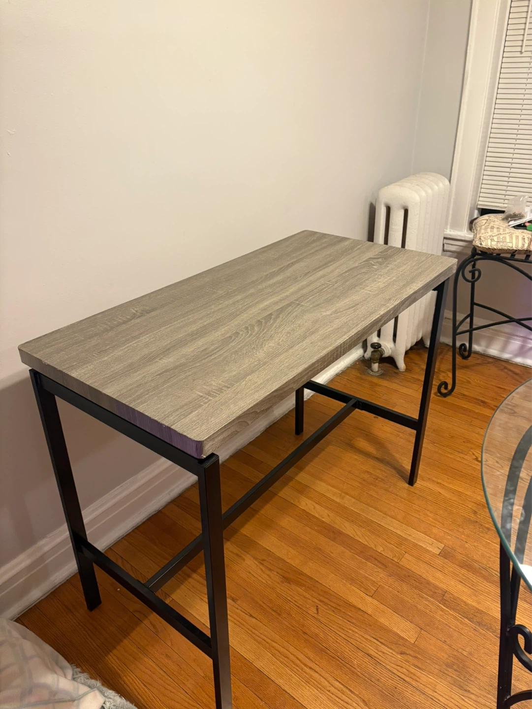 Gray Wood Grain Dining Table with Black Metal Frame