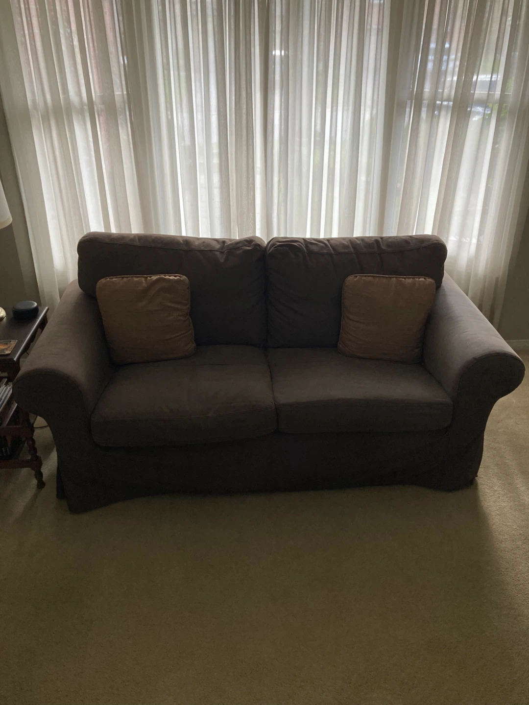 Ektorp Two-Seater Sofa with Tan Cushions