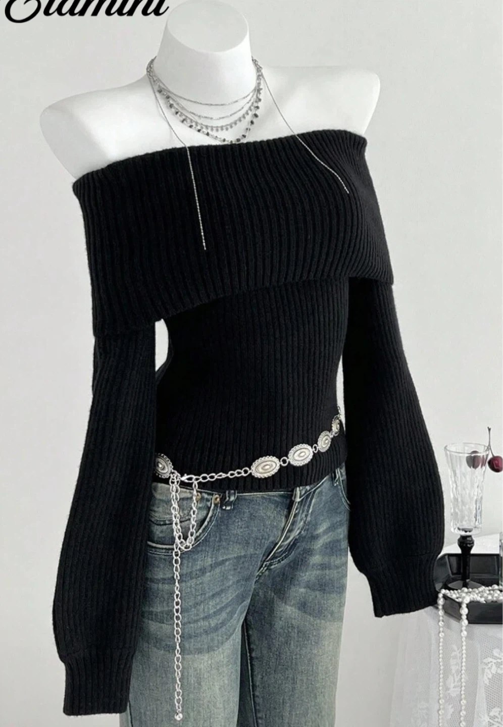 Black Off-the-Shoulder Ribbed Knit Sweater with Chain Detail