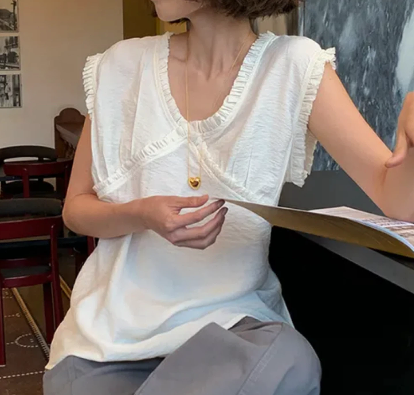 Ivory Sleeveless Ruffled V-Neck Top