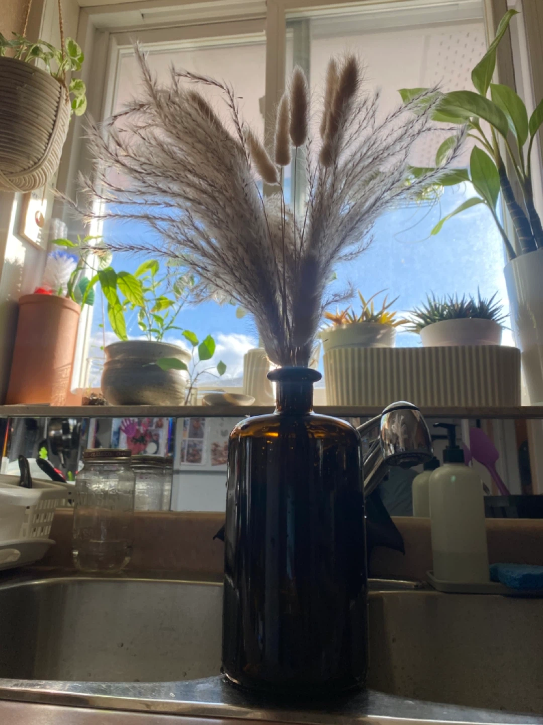 Amber Glass Bottle Vase with Dried Flowers