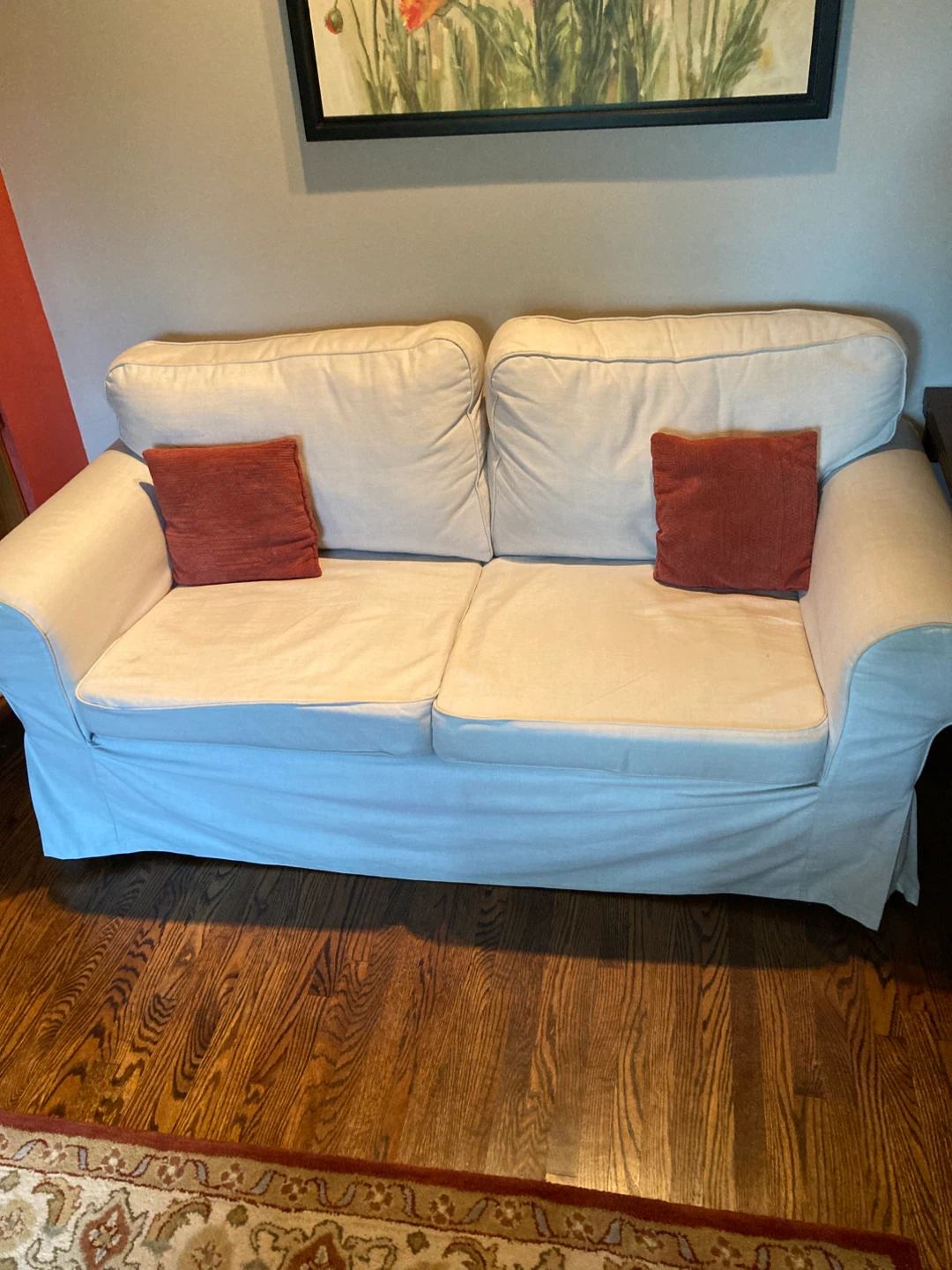 Ektorp Beige Two-Seater Sofa with Two Red Throw Pillows - photo 2