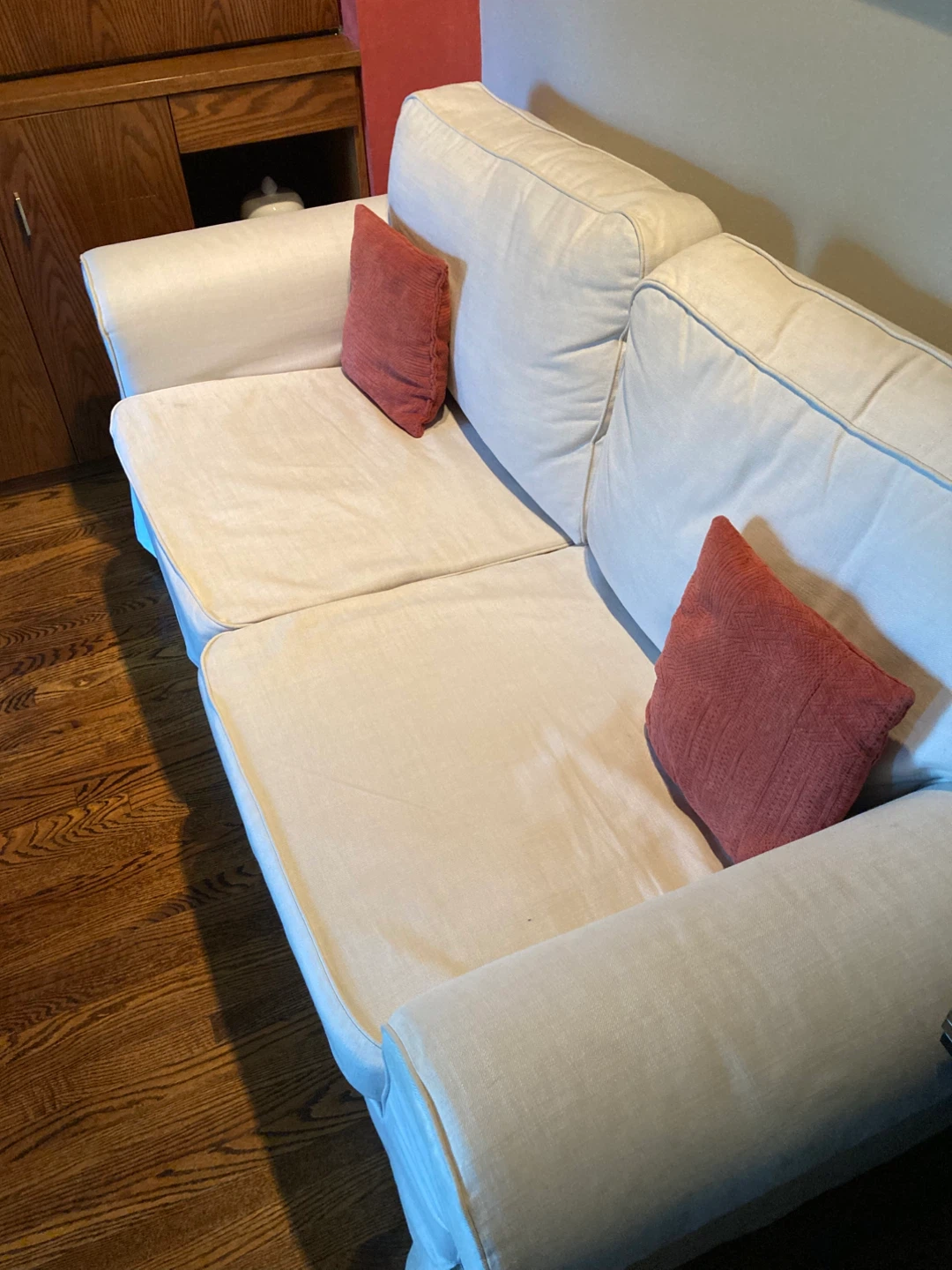 Ektorp Beige Two-Seater Sofa with Two Red Throw Pillows - photo 3