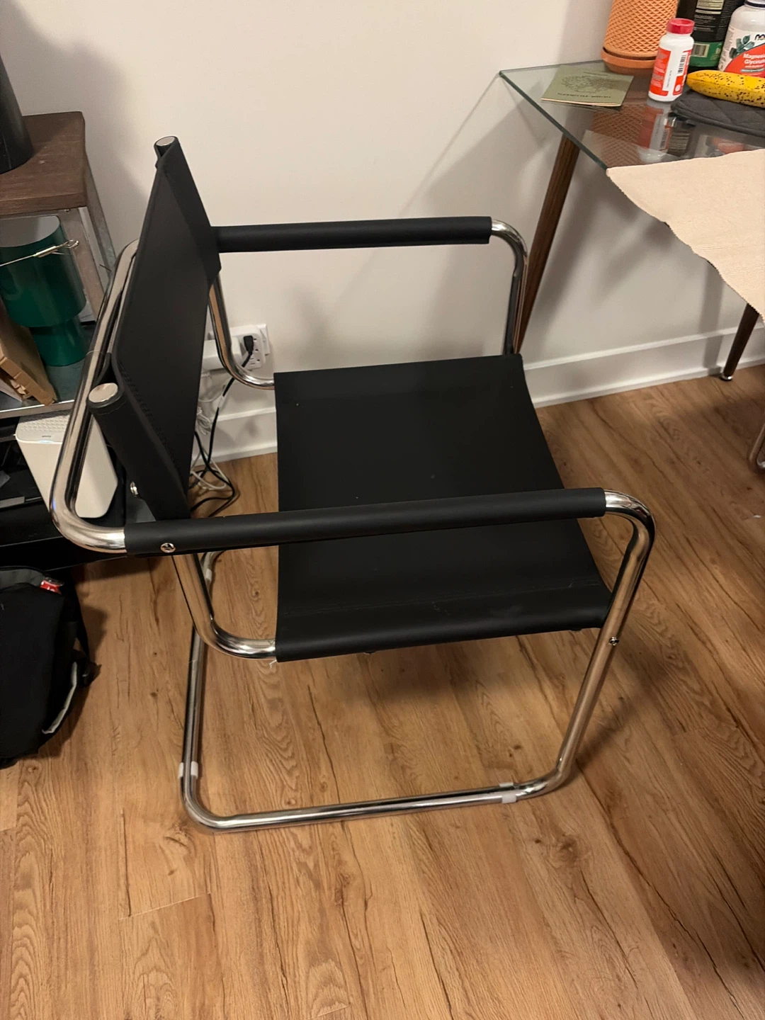 Black vegan Leather Sling Chair with Chrome Frame