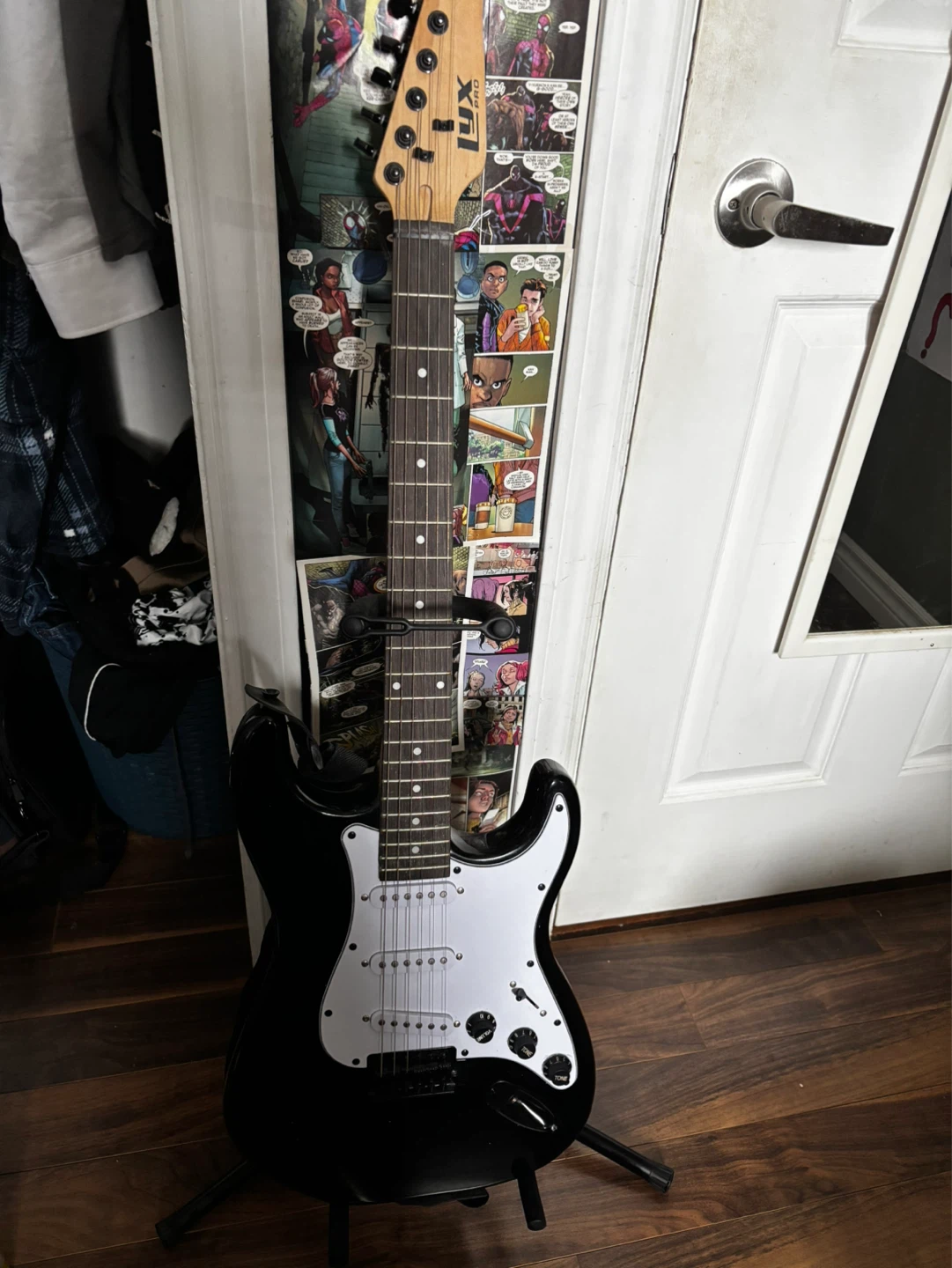 Black Electric Guitar with Amp