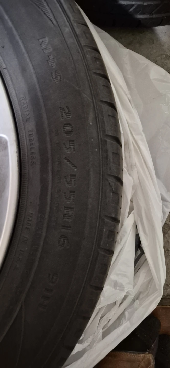 Set of 4 Hyundai Wheels and Tires 205/55R16 - photo 2