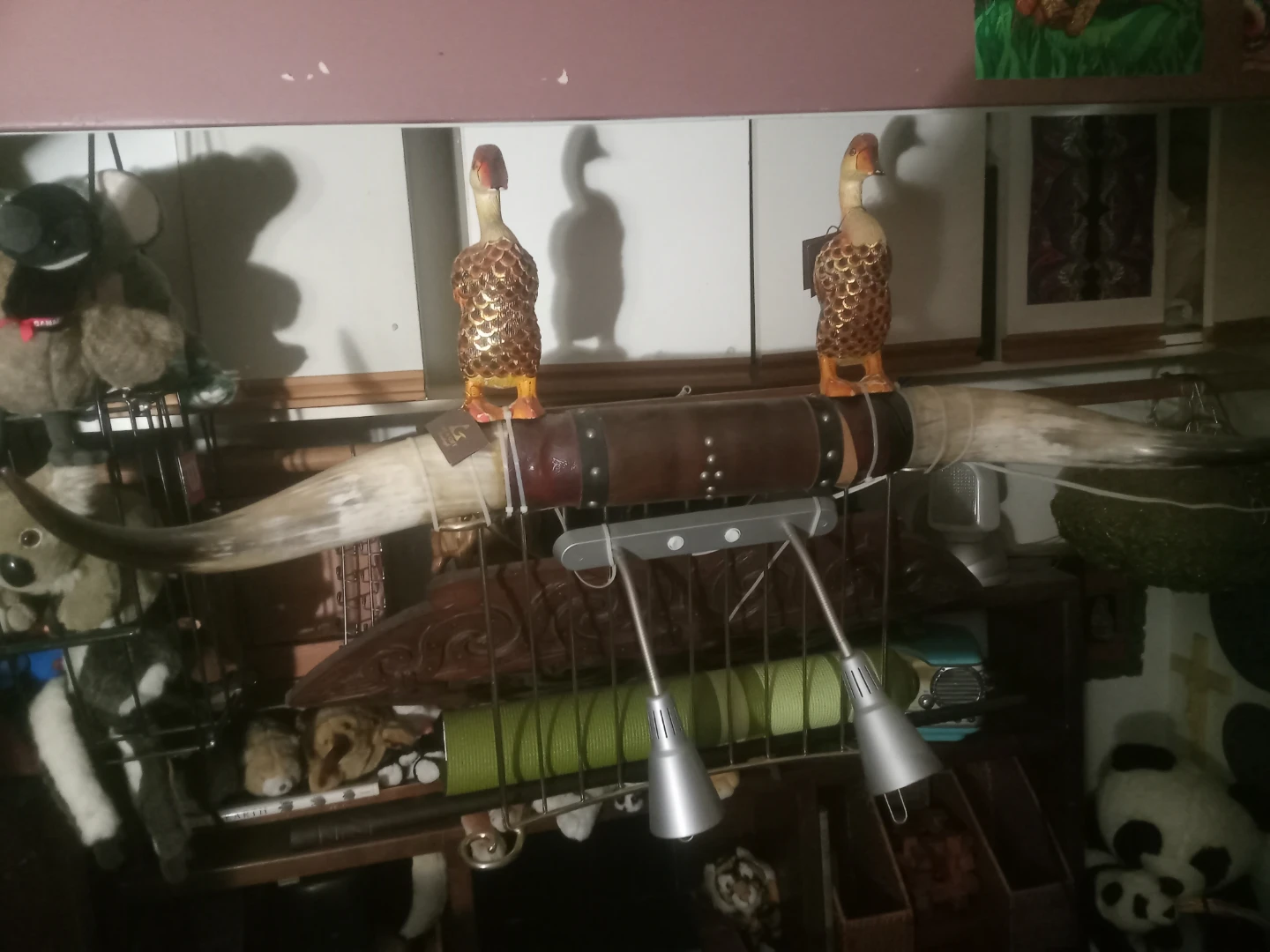 Decorative Goose Statues on Bull Horns