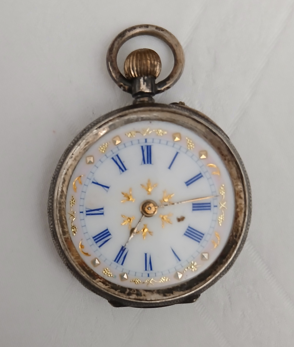 Ornate Silver Pocket Watch with Roman Numerals