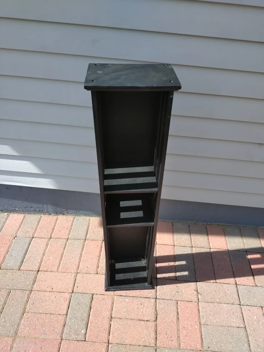 Black narrow shelf unit