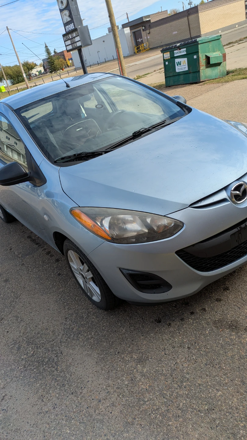 Light Blue Mazda 2
