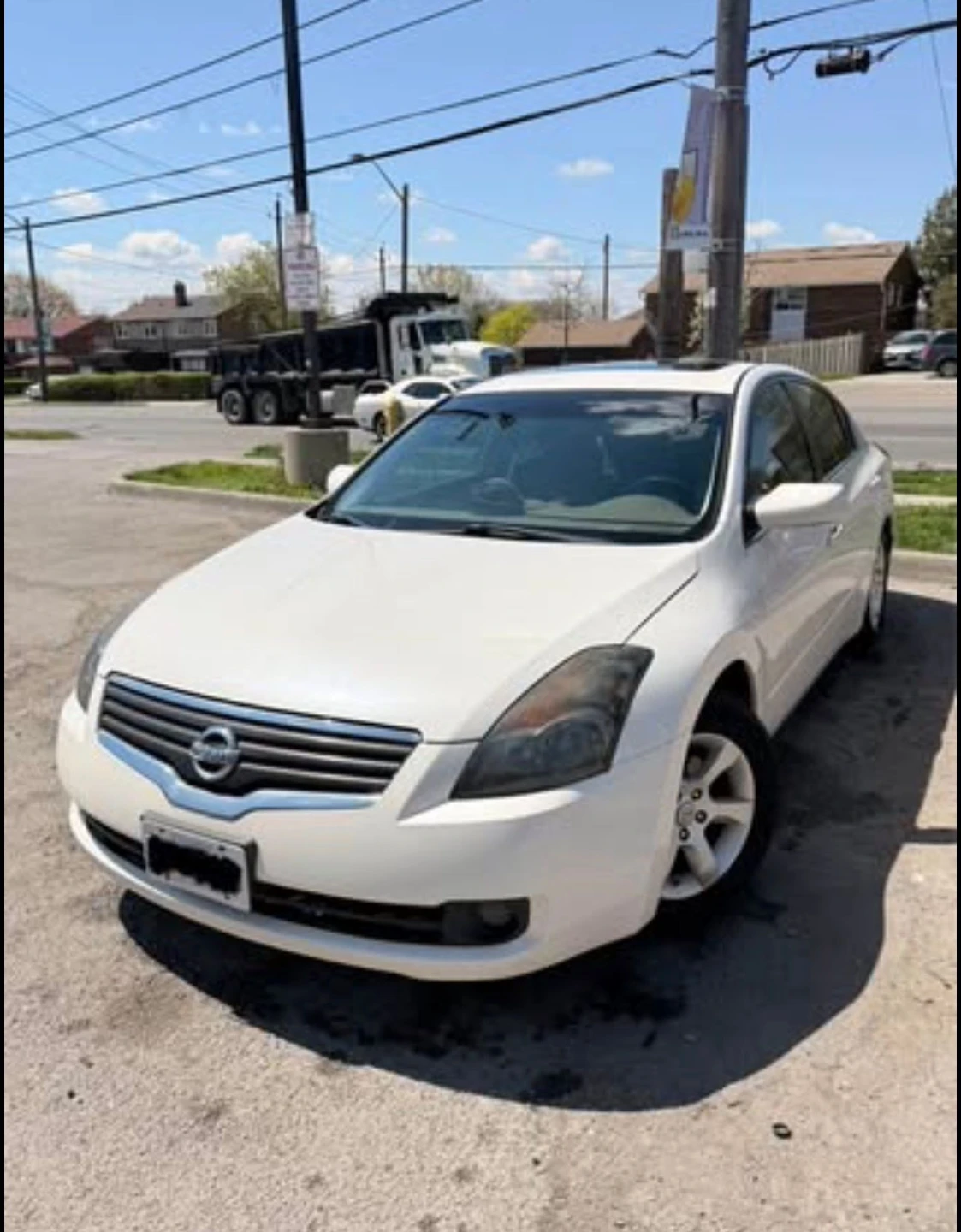 White Nissan Altima 2.5 SL Sedan