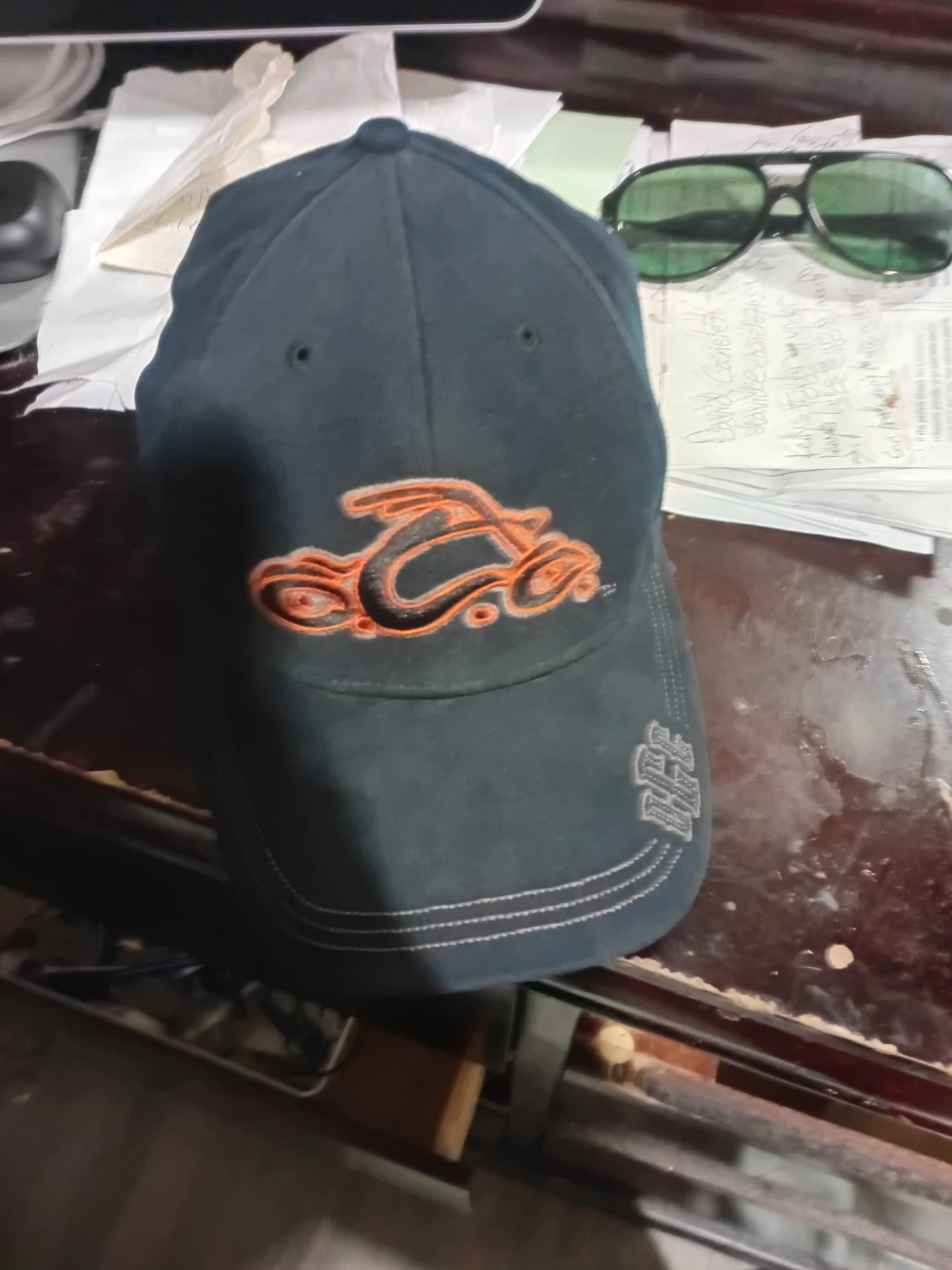 Dark Blue Baseball Cap with Orange Logo