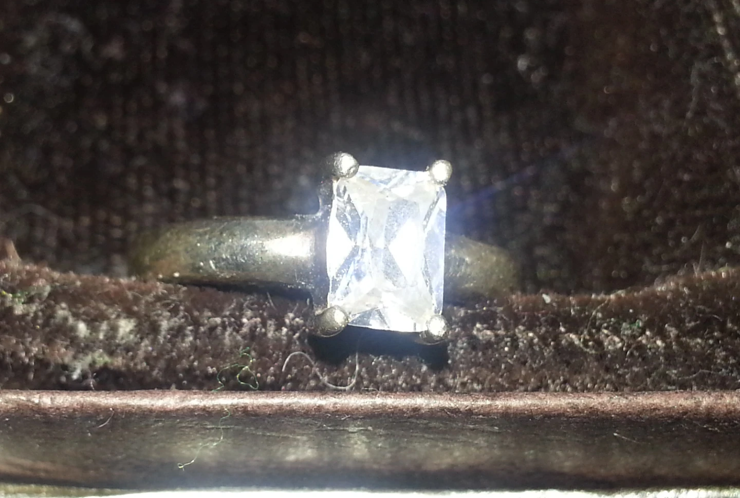 Silver tone rings with clear and amber stones
