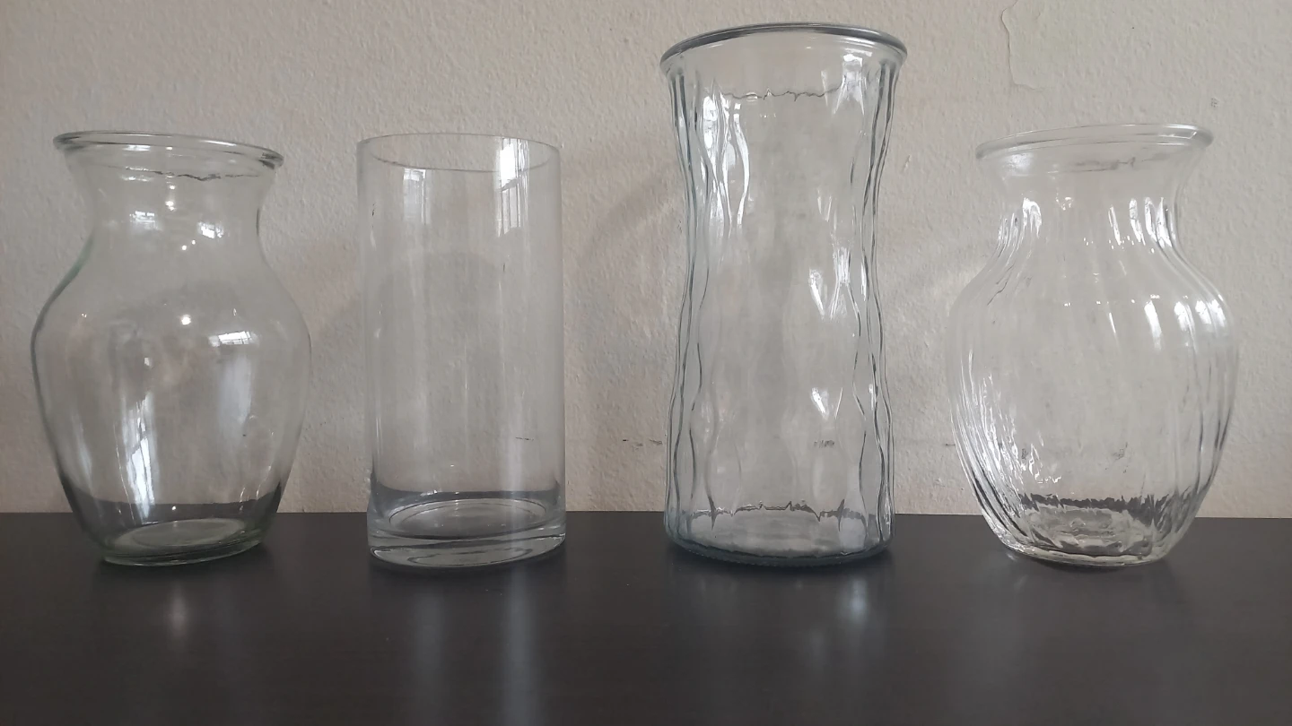Set of 4 clear glass vases together or individually
