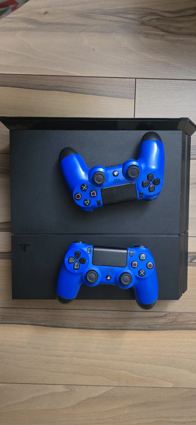Sony PlayStation 4 Slim Console with 2 Blue Controllers