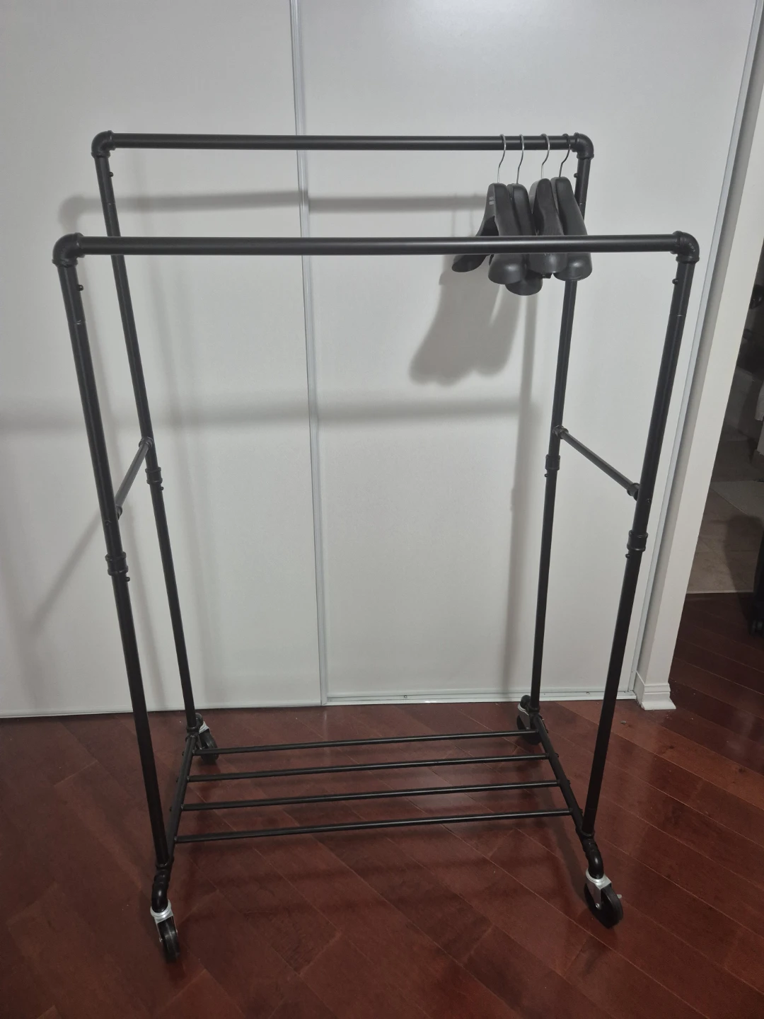 (Available until May 1st) Black Metal Rolling Garment Rack