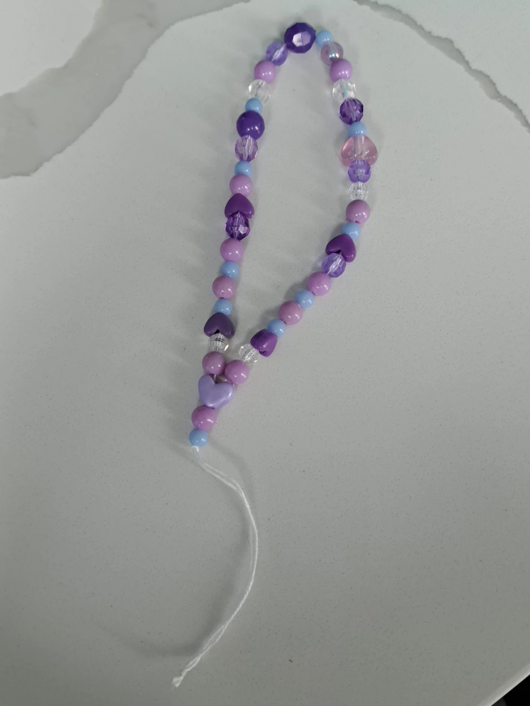 Purple beaded phone charm