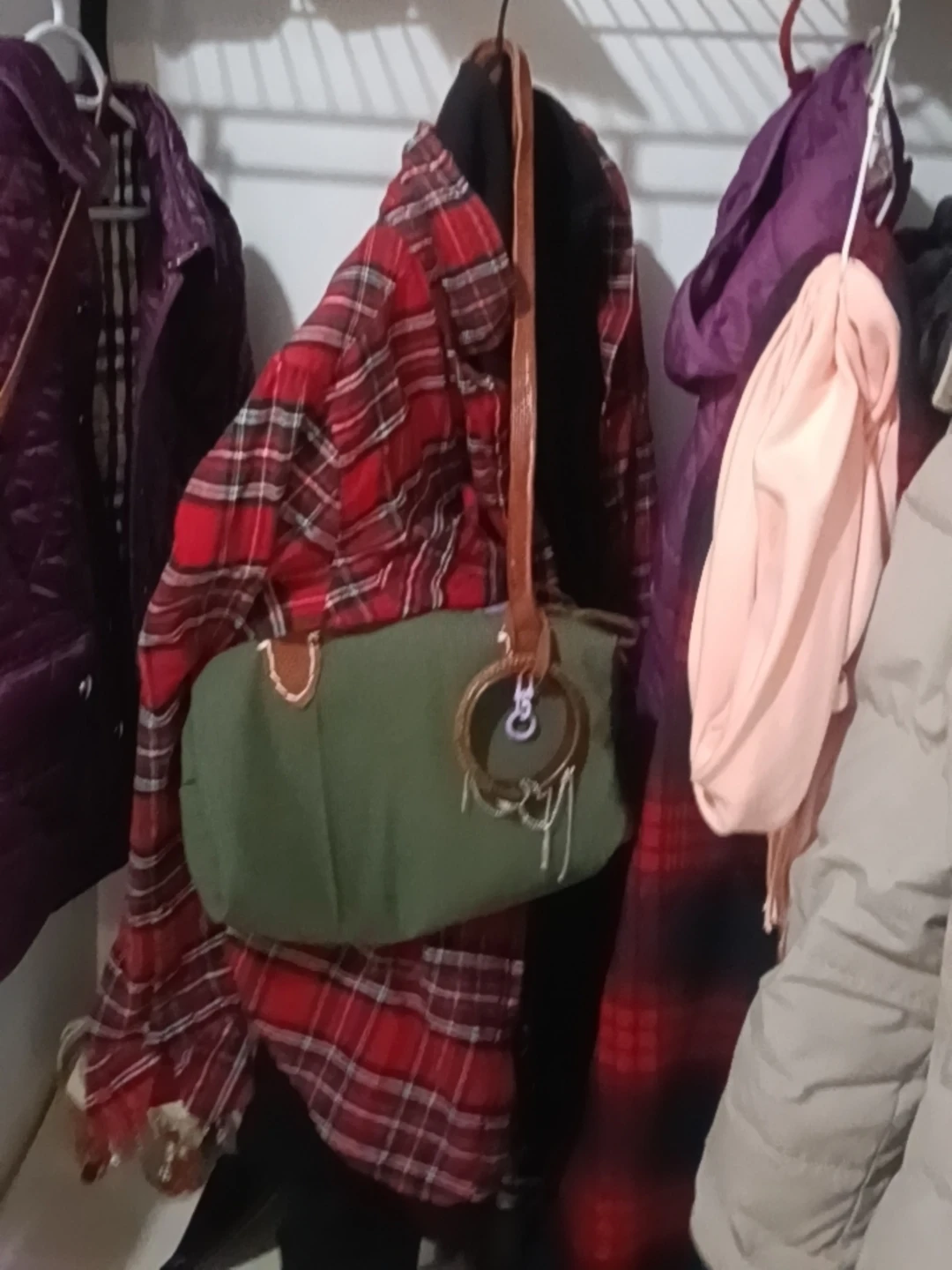 Green canvas handbag with leather strap