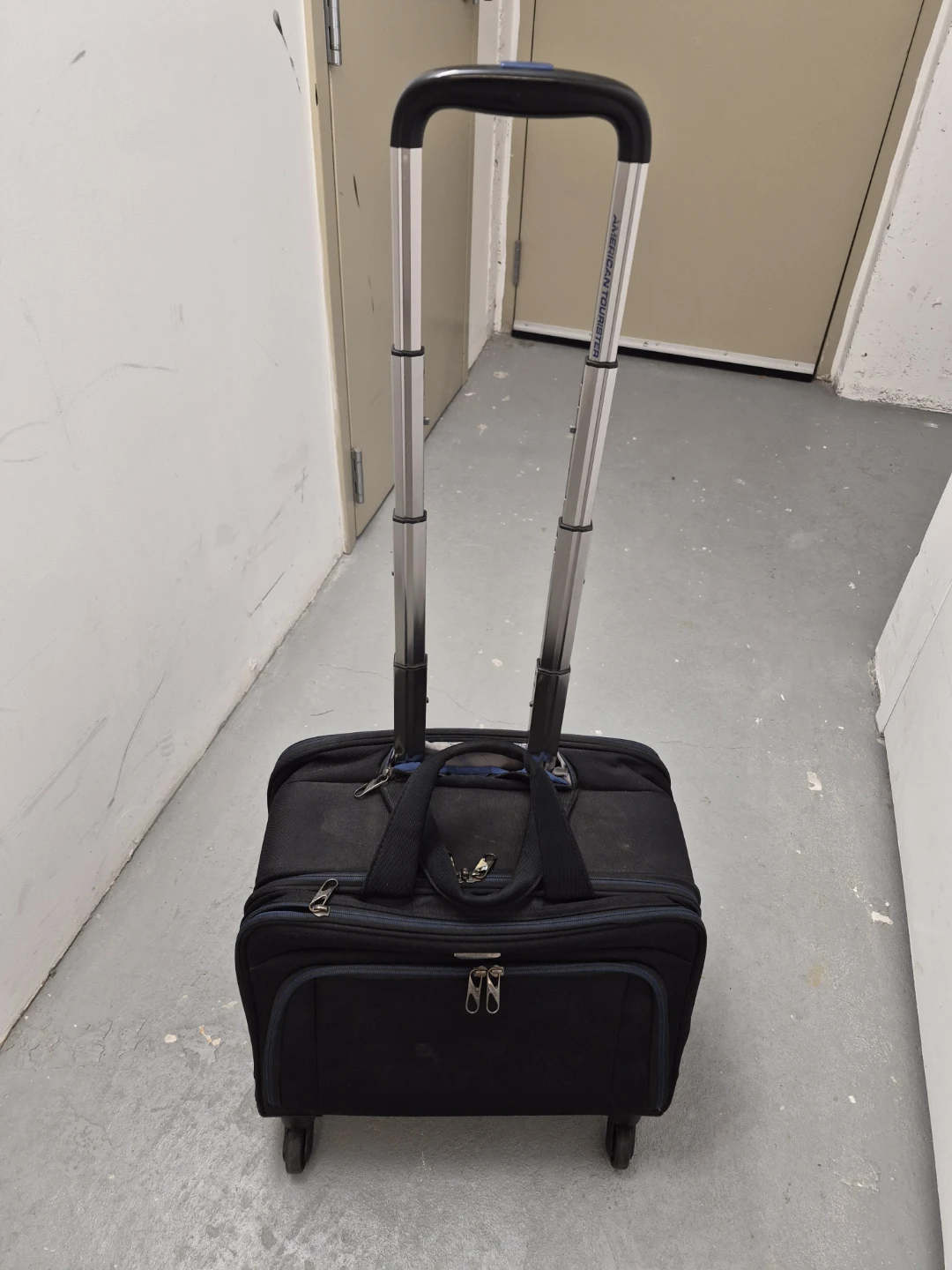 American Tourister Black Rolling Carry-On Luggage