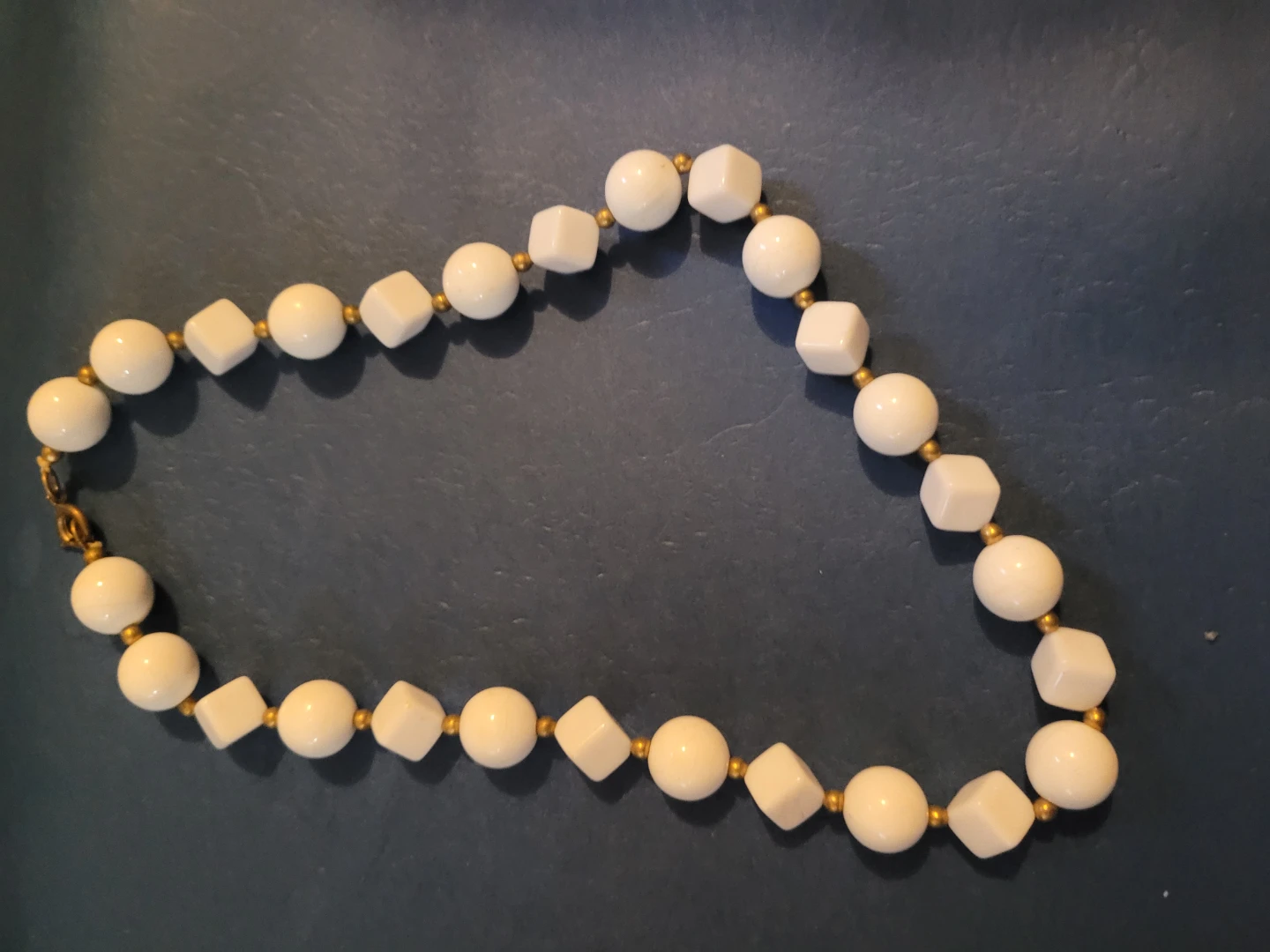 White Beaded Necklace with Gold Accents