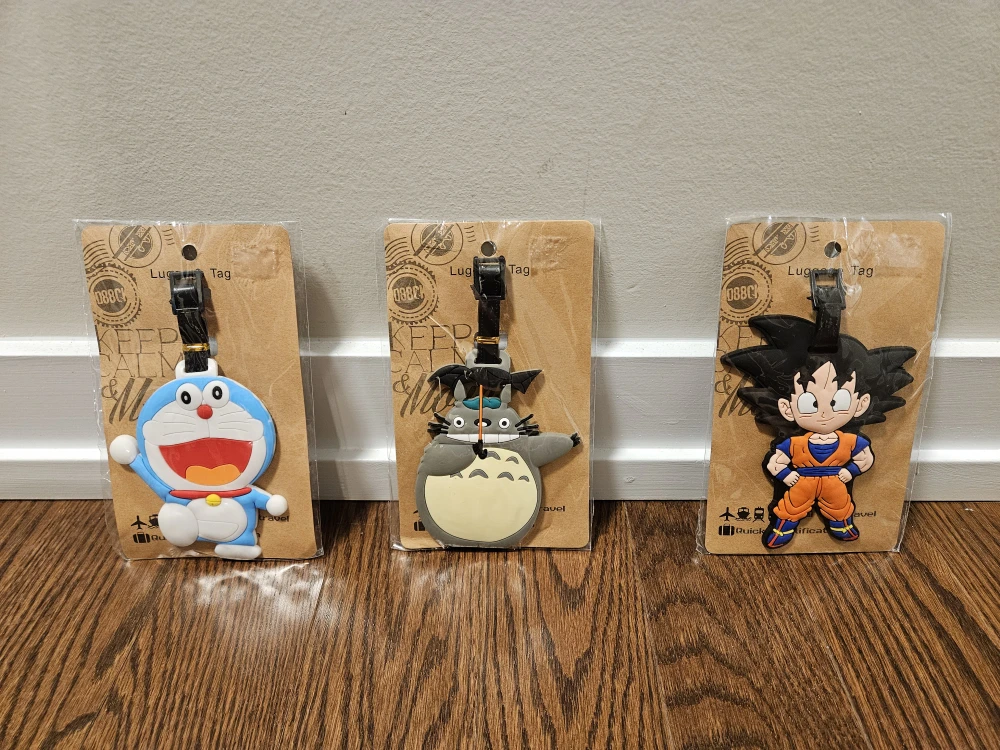 3 Anime Luggage Tags - Doraemon, Totoro, Goku. $15 each