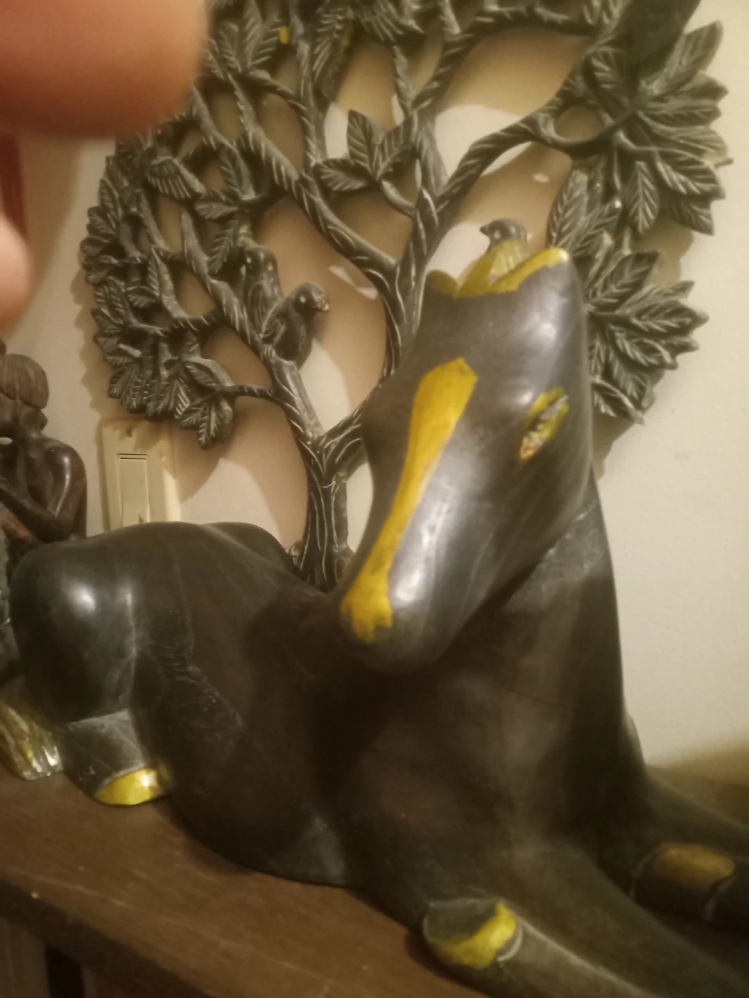 Dark Sculpture with Yellow Accents