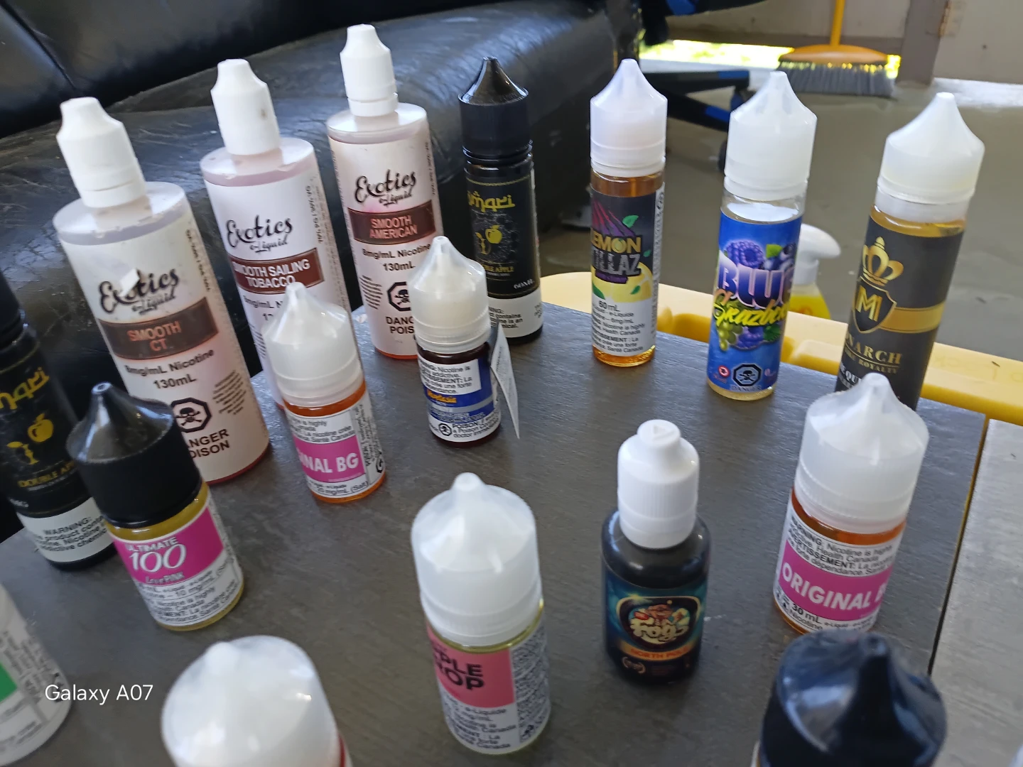 Assorted Vape Juice Bottles and Pods