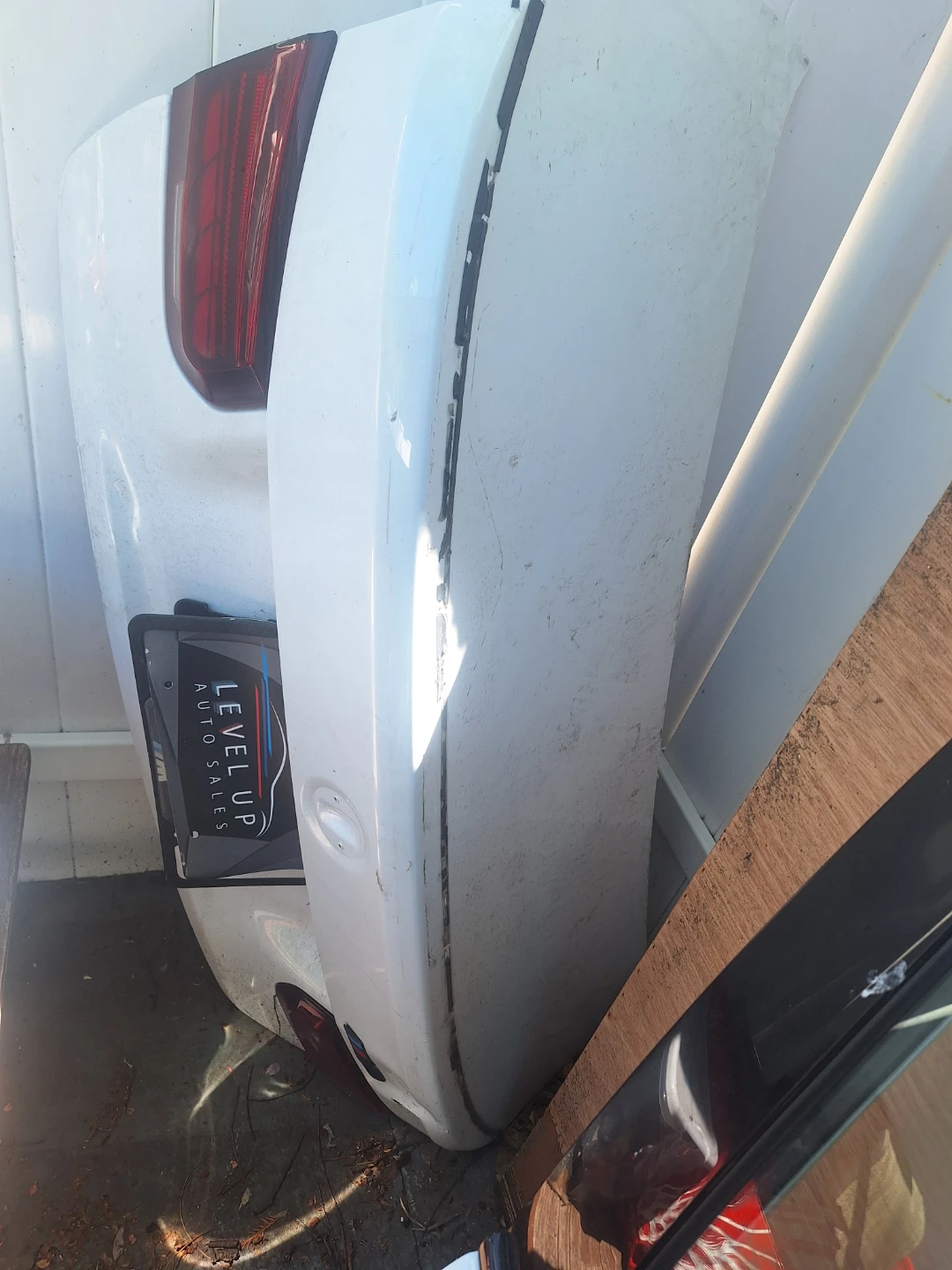 White Car Bumper with Taillight