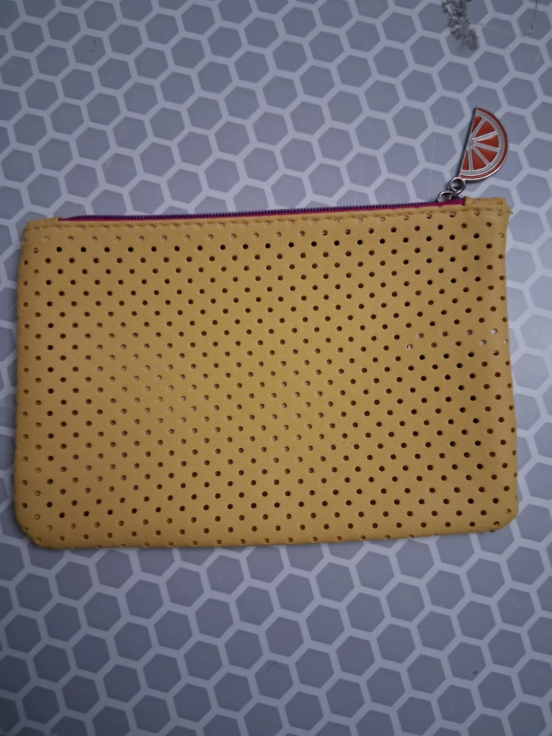 Yellow Perforated Zipper Pouch with Orange Slice Charm