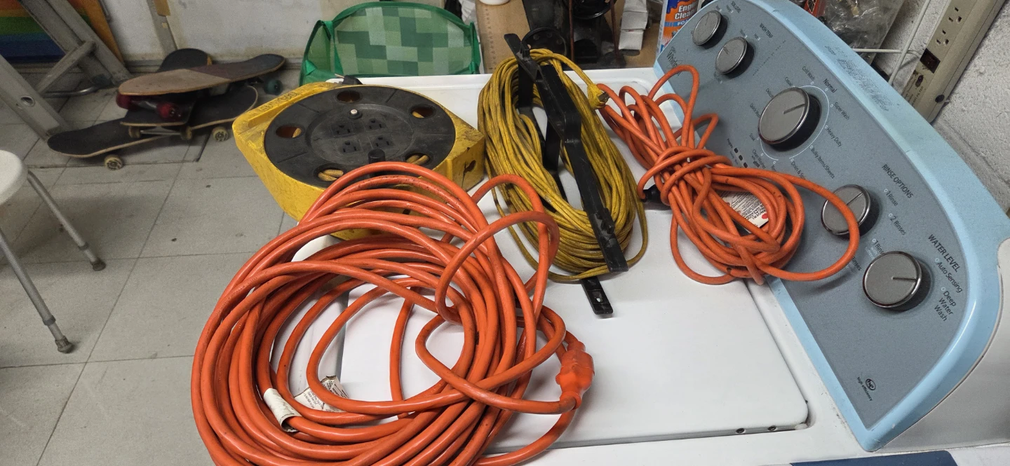 Orange Extension Cords and Yellow Cord Reel