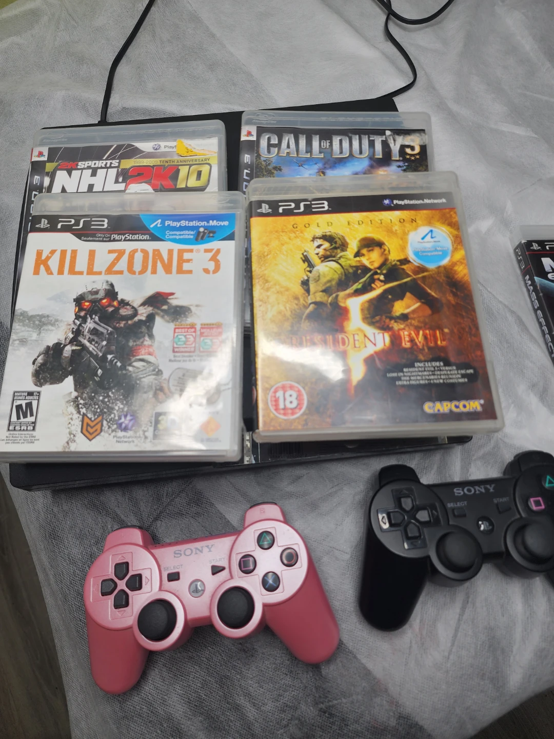 PlayStation 3 Slim Console with 5 Games and 2 Controllers - photo 2