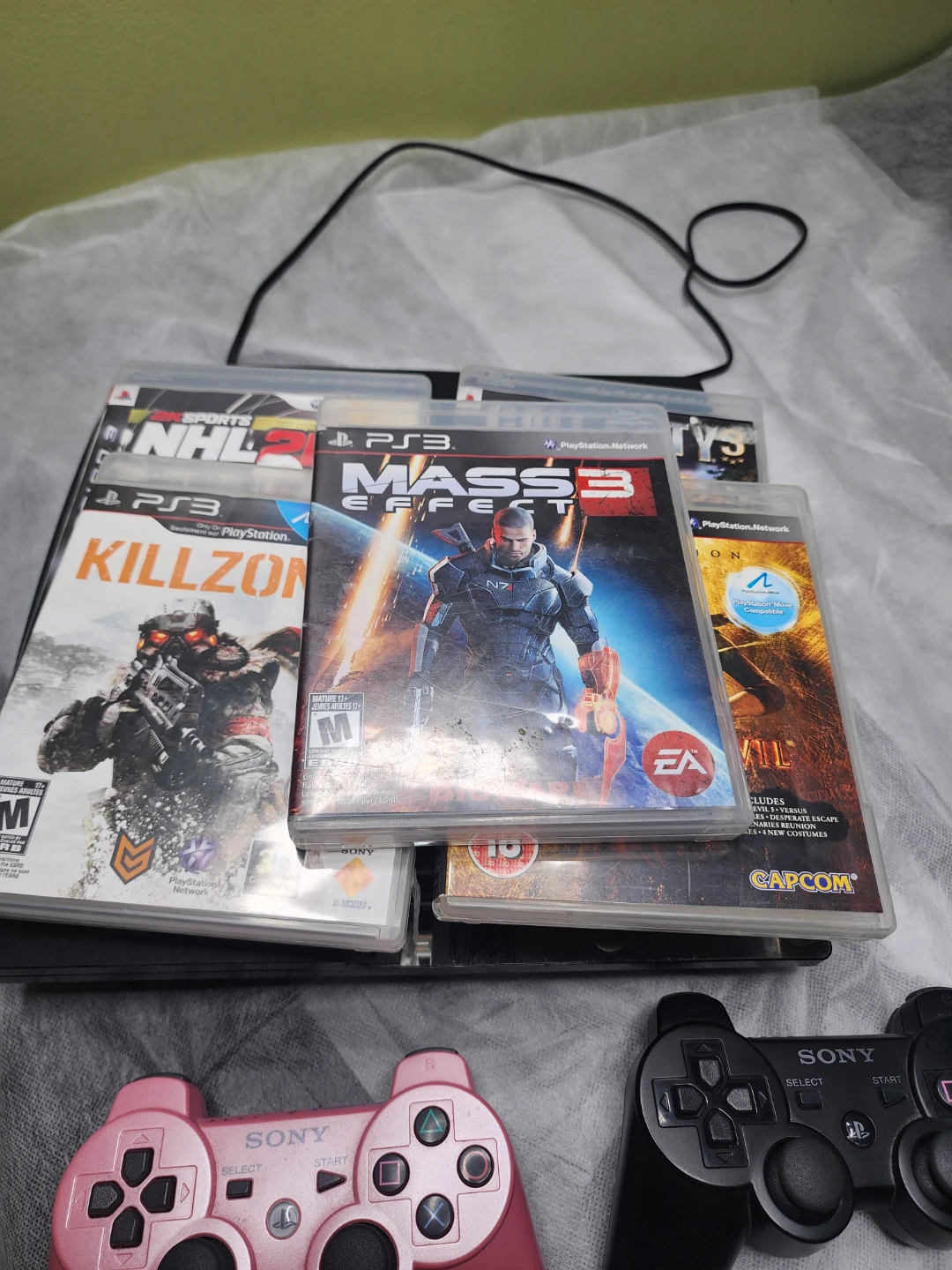 PlayStation 3 Slim Console with 5 Games and 2 Controllers - photo 3