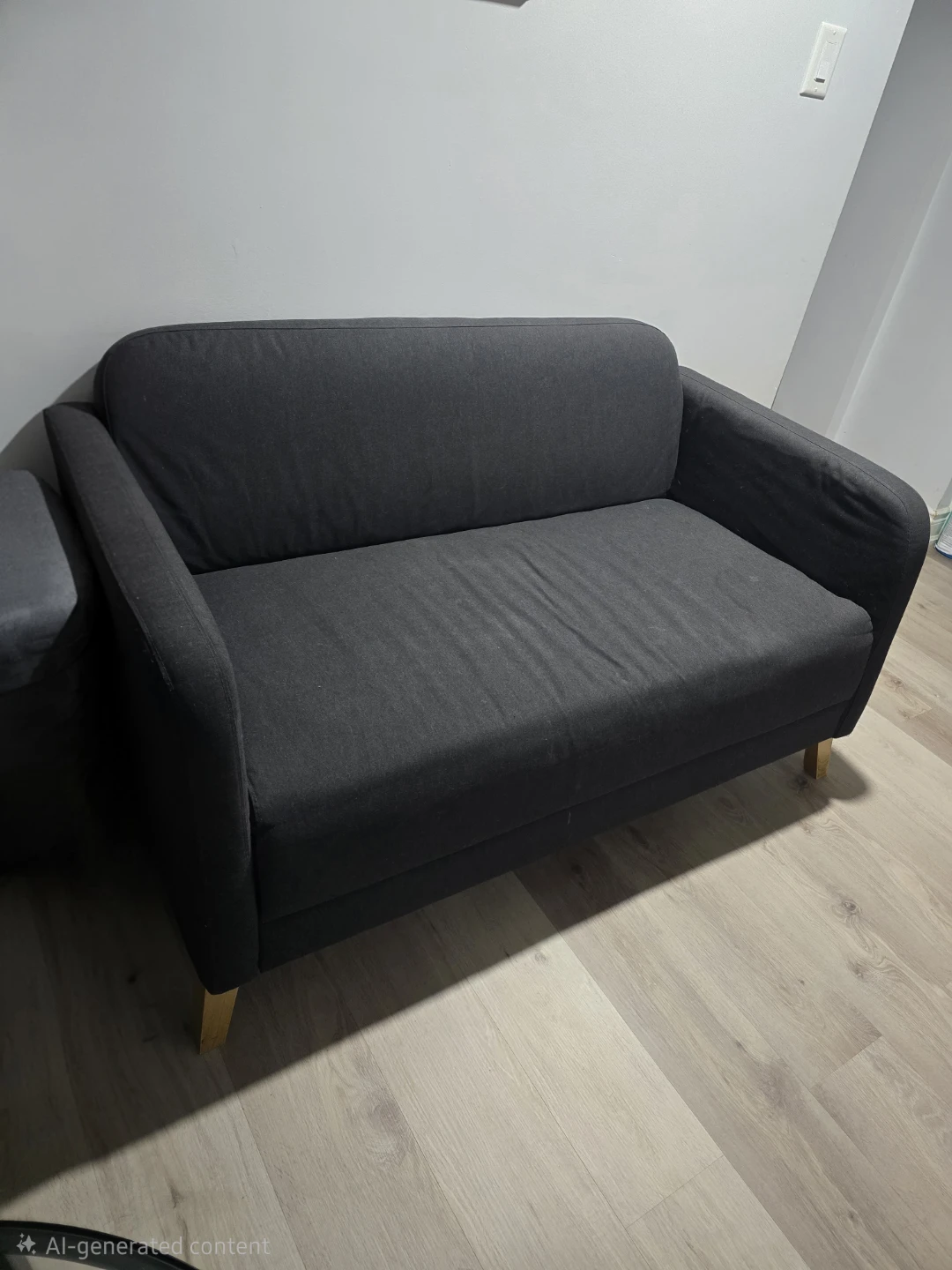 IKEA LINANÄS loveseat in Vissle dark gray.