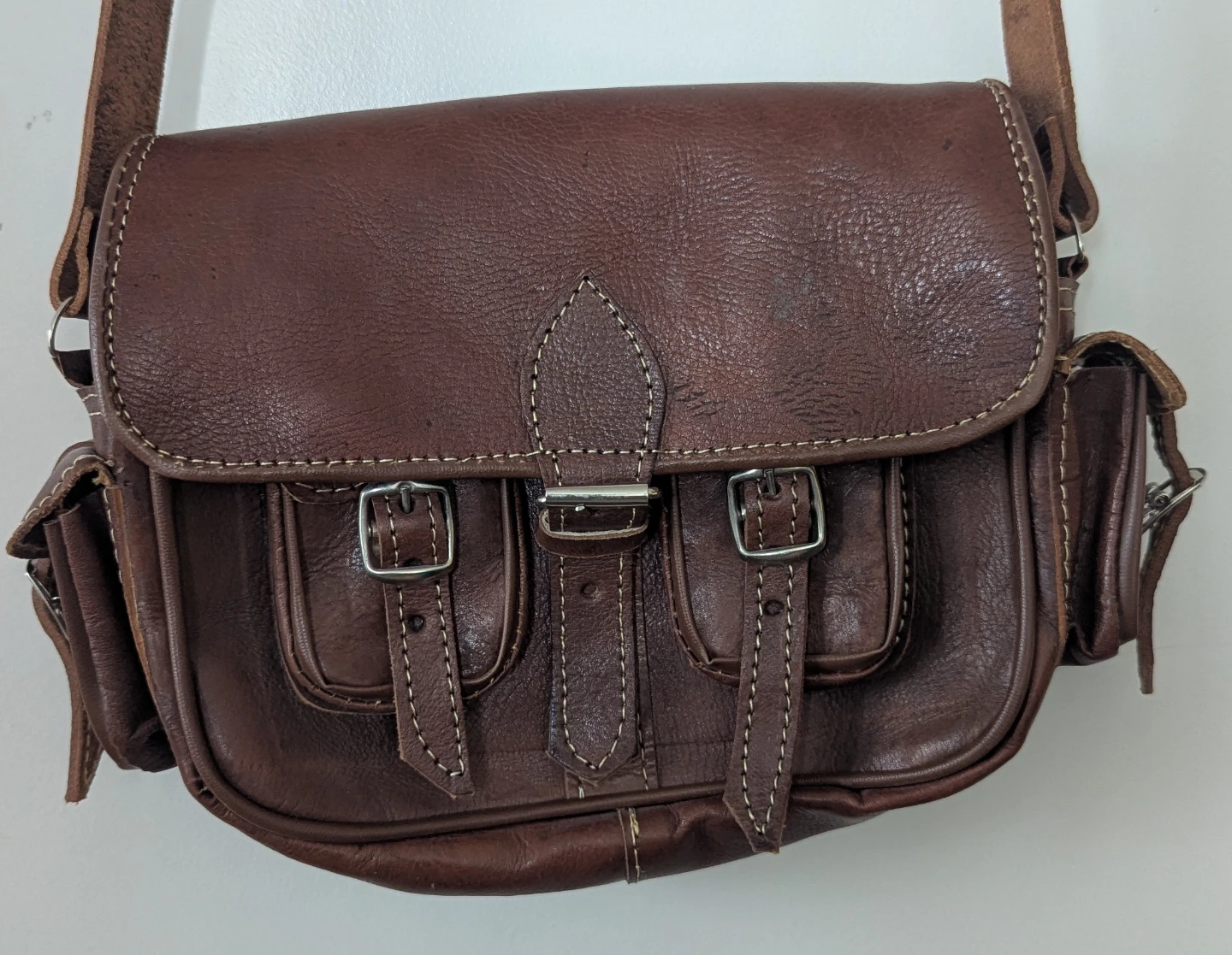 Vintage leather cross body bag from Morocco