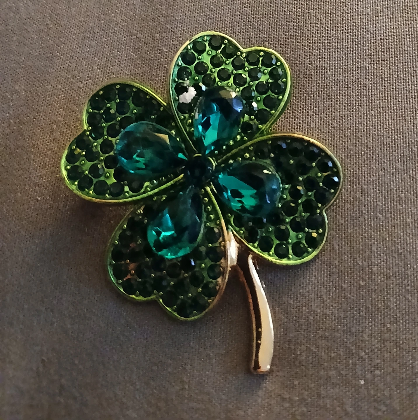 Gold Tone Four Leaf Clover Brooch with Green Crystals