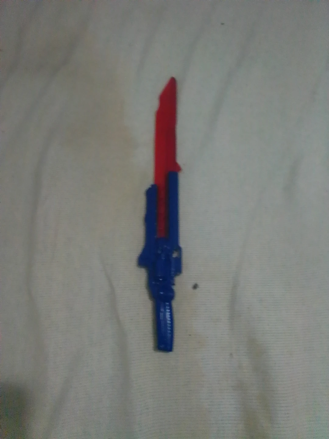 Blue and Red Toy Sword Accessory