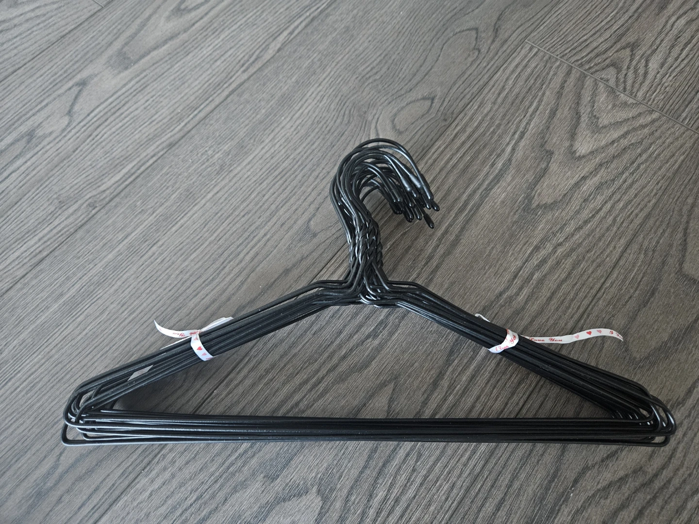 20 Black clothes hangers (metal)