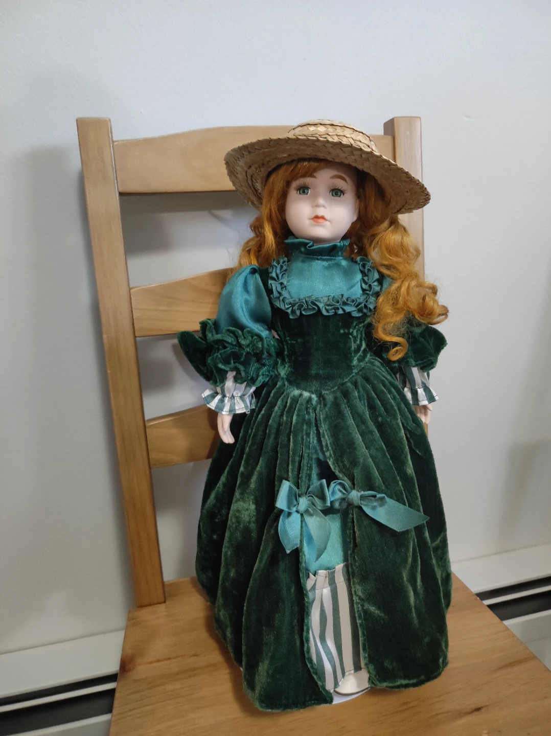 Vintage Porcelain Doll in Green Dress with Straw Hat