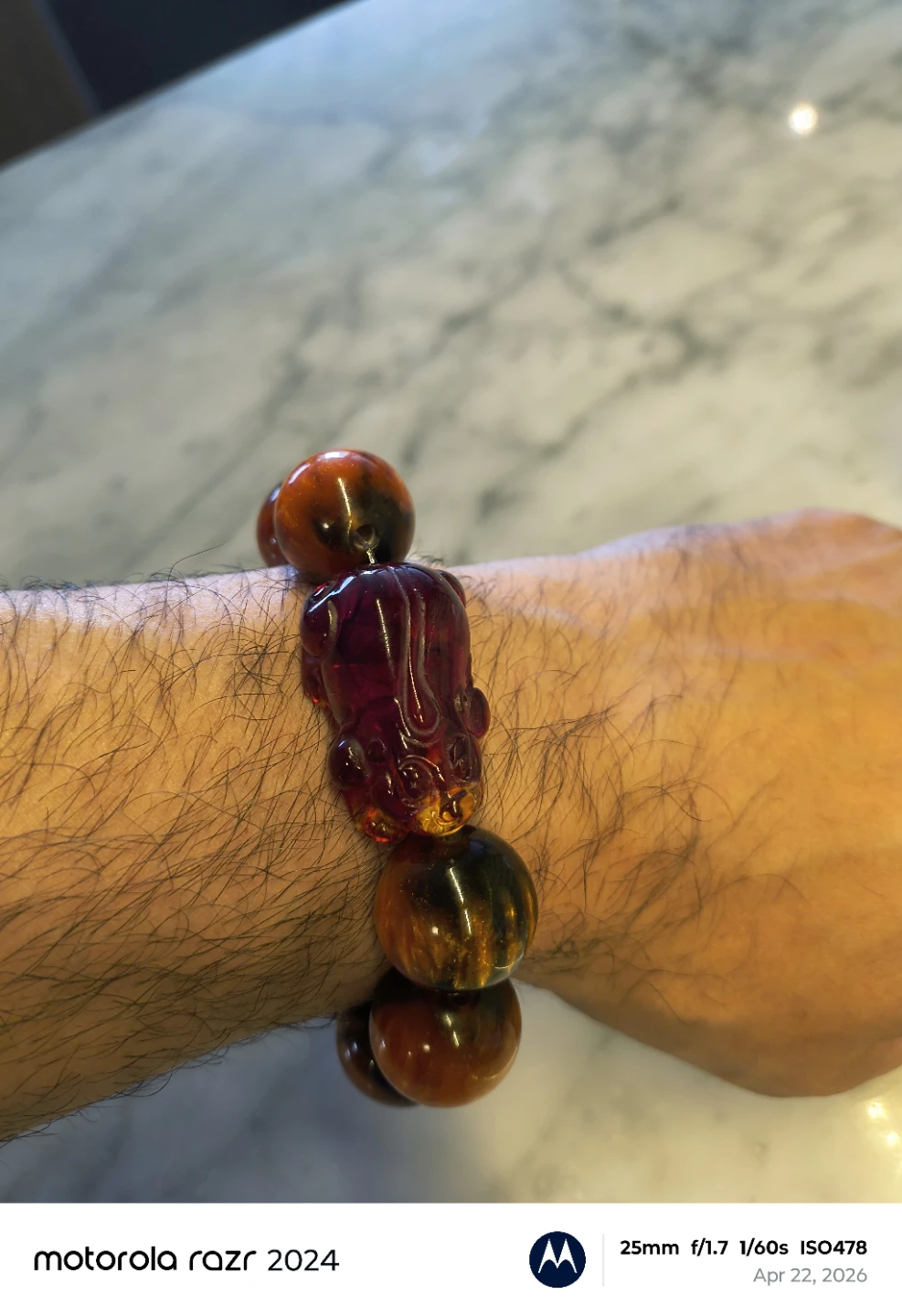 Bracelet with Carved Figurine and Amber Beads