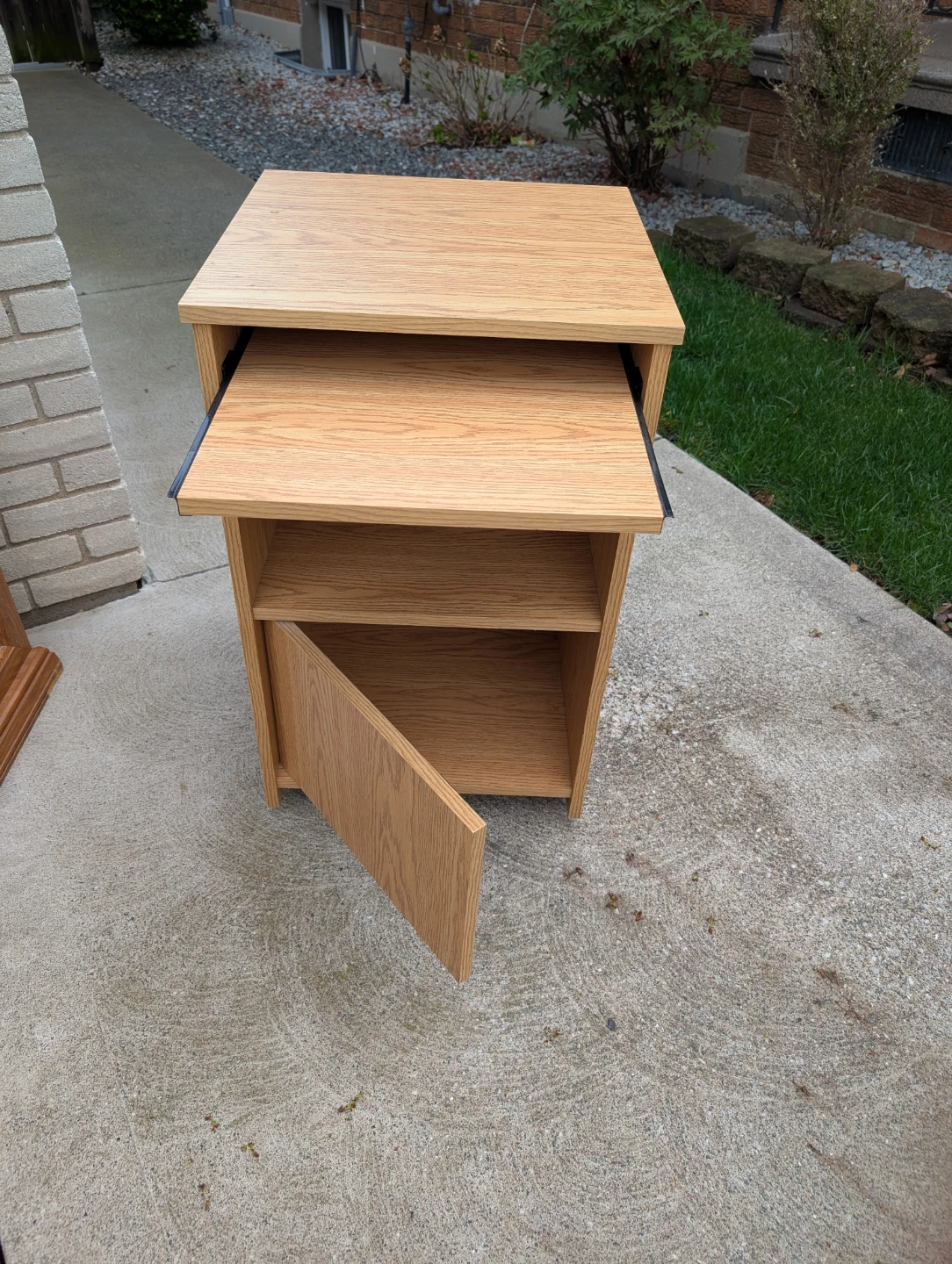 Wooden computer stand with shelves and cabinet