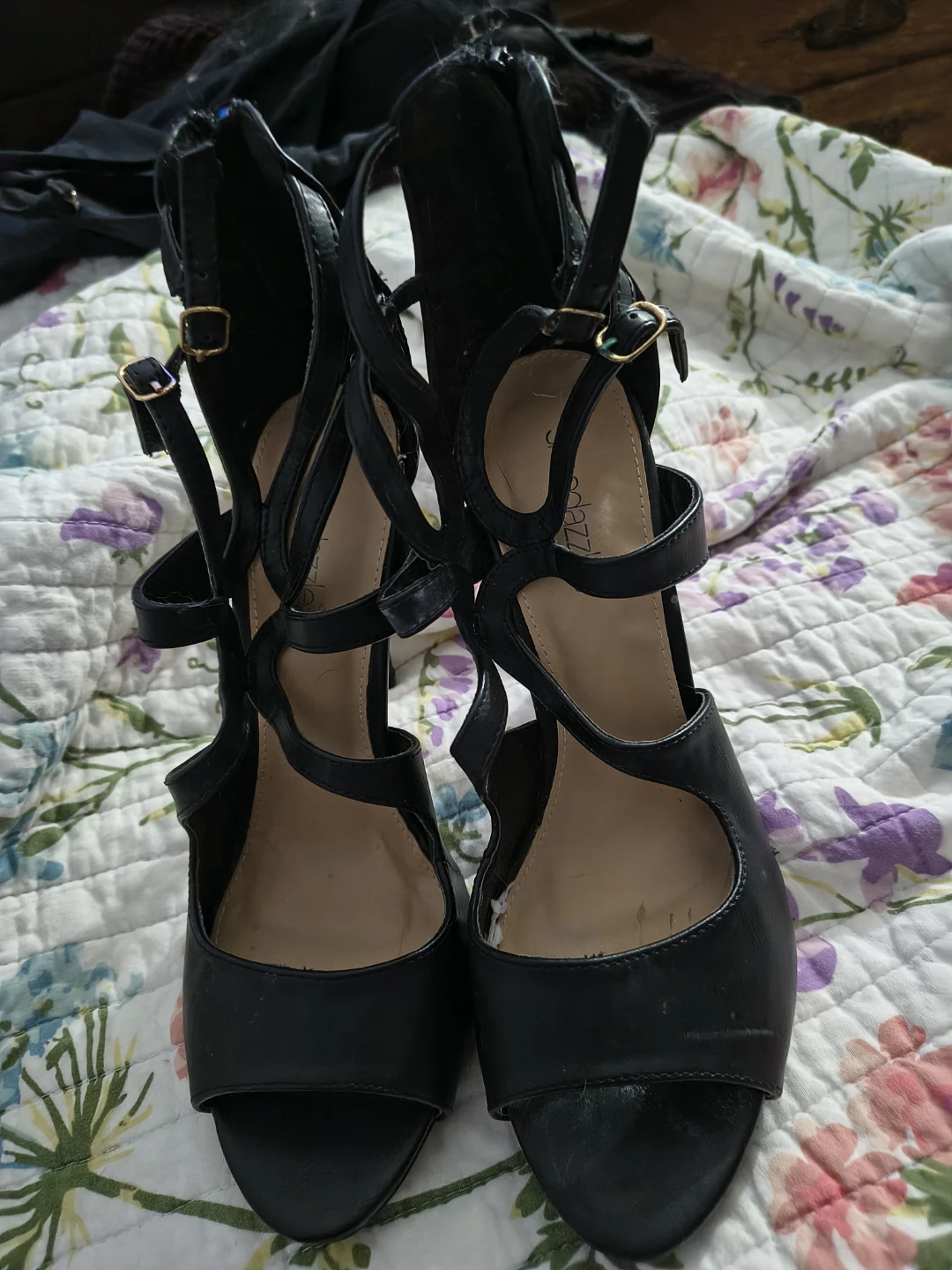 Black strappy high heels by Dazzle
