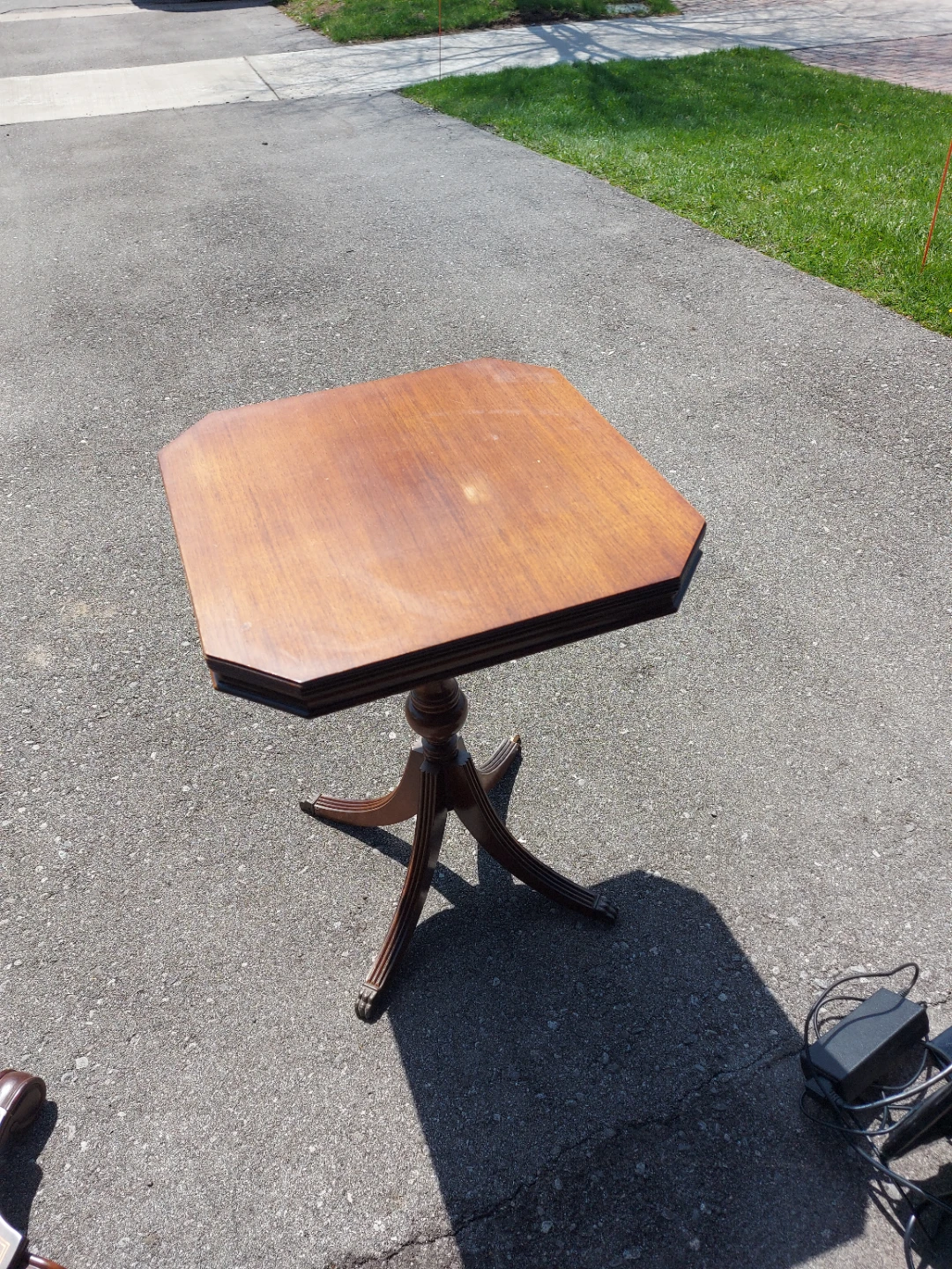 Wooden pedestal accent table