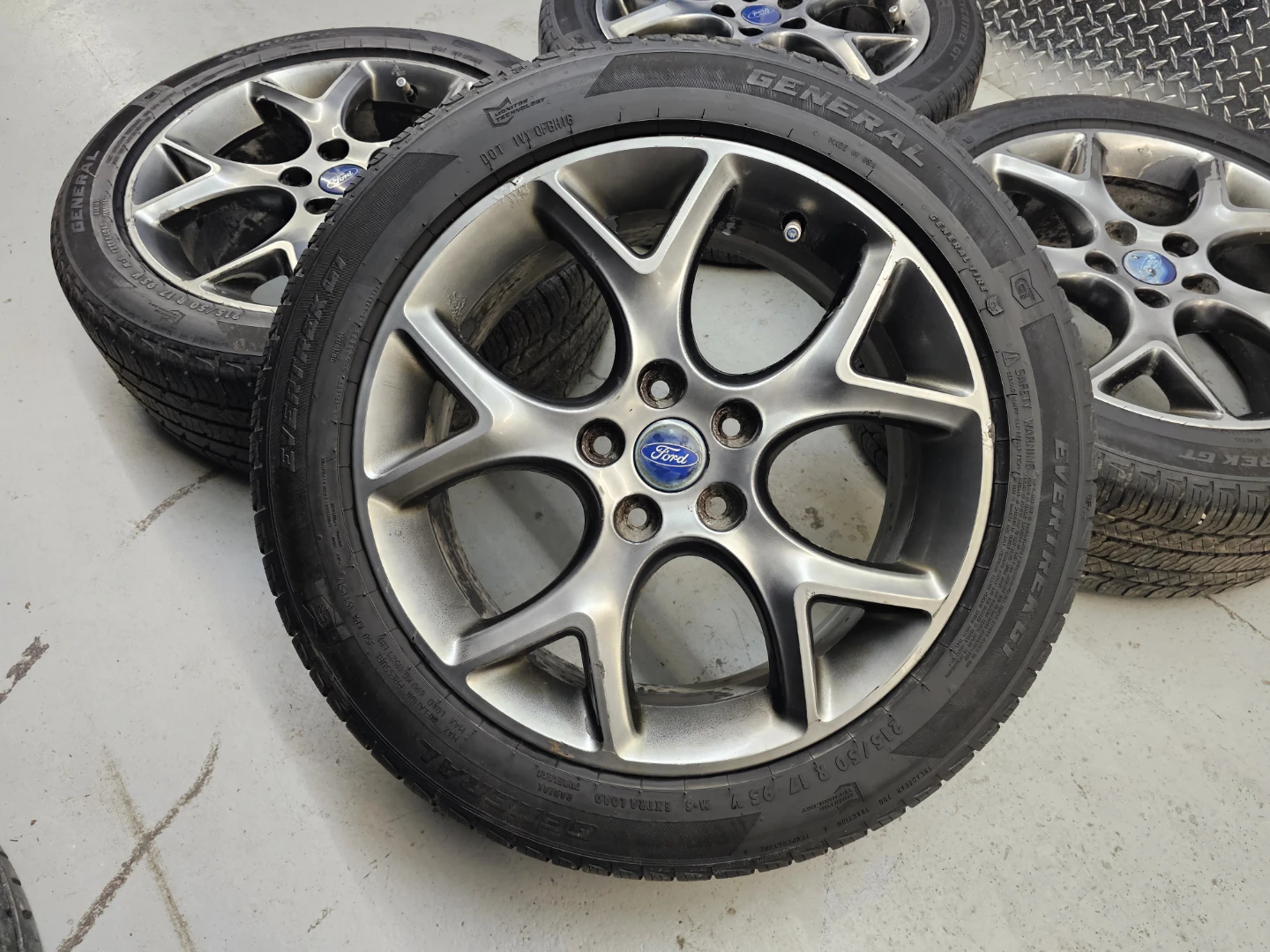 FORD FOCUS O.E.M RIMS AND ALL SEASON TIRES 215/50 R17