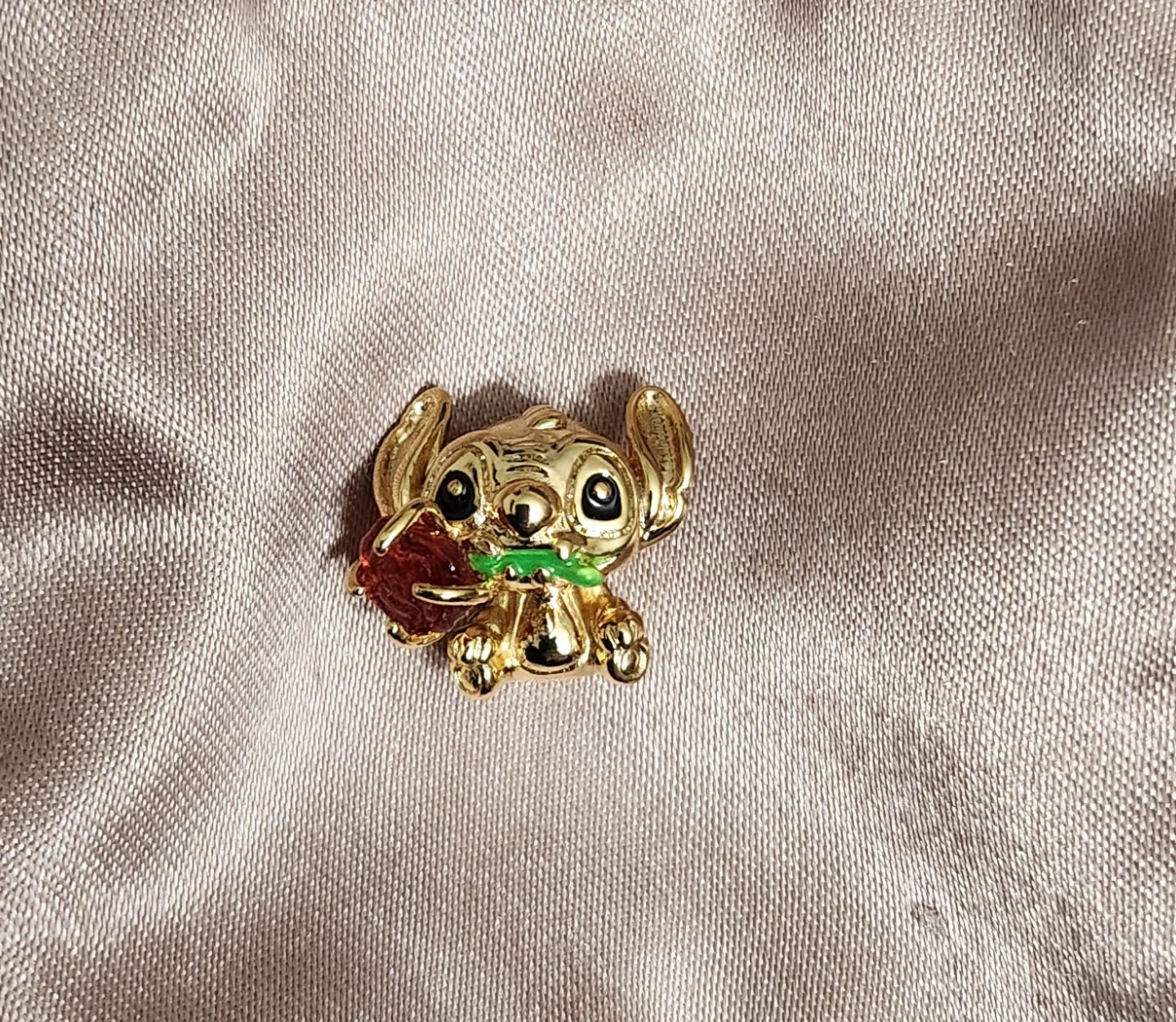 Gold Stitch Charm with Red Flower