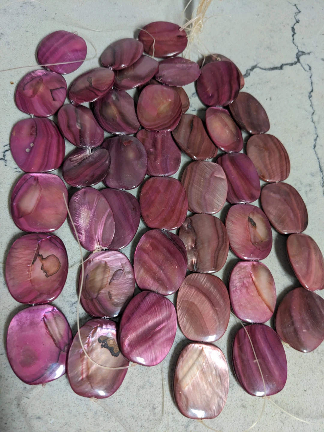 Large rectangular purple shell beads