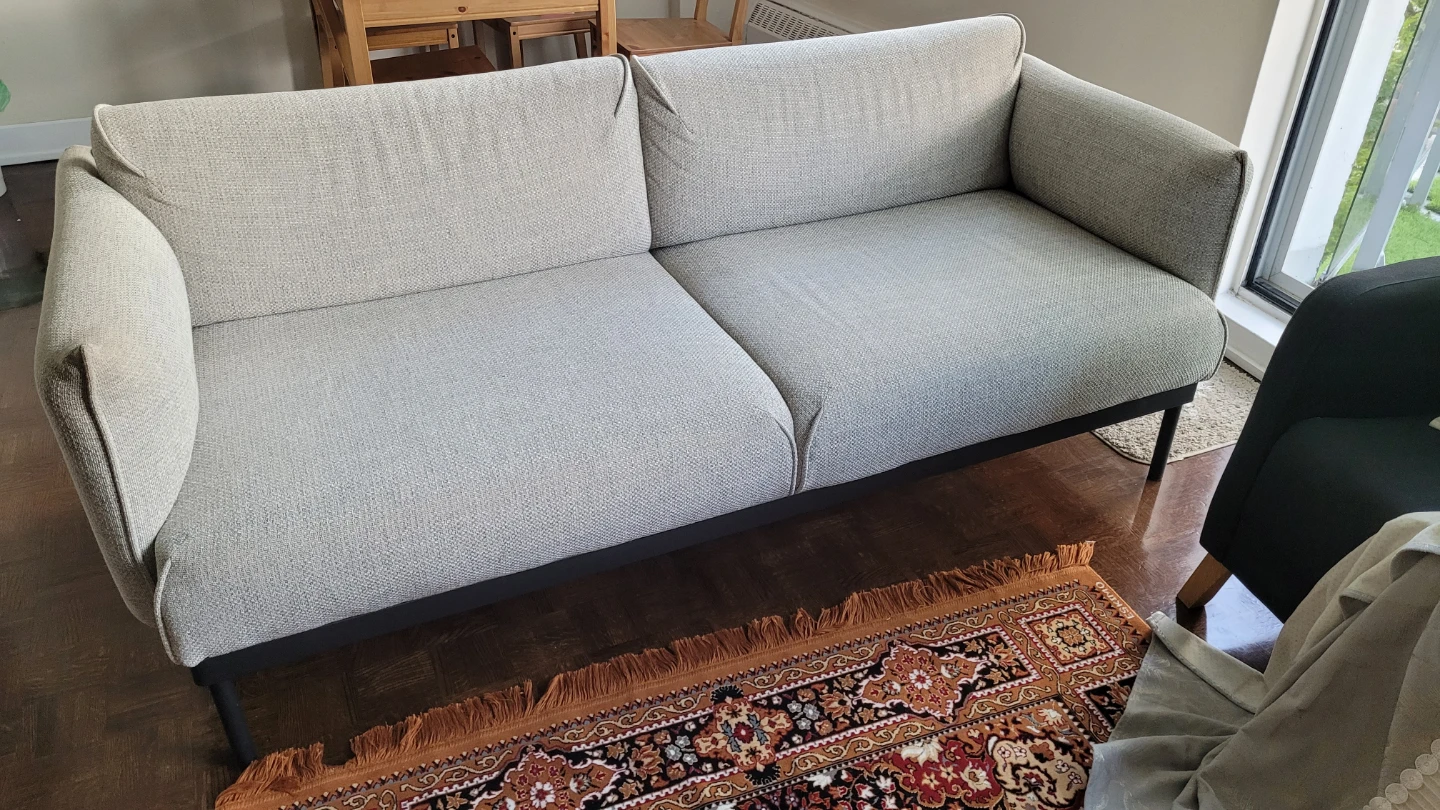 Moving out sale. Ikea sofa is 3 seater in light gray colour - photo 2