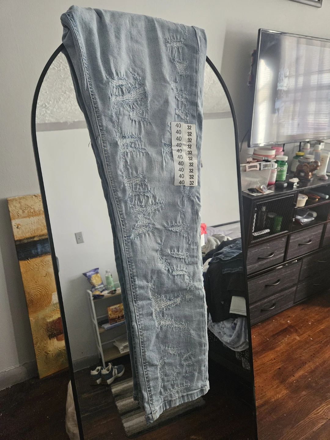 Distressed Light Wash Denim Jeans - photo 3